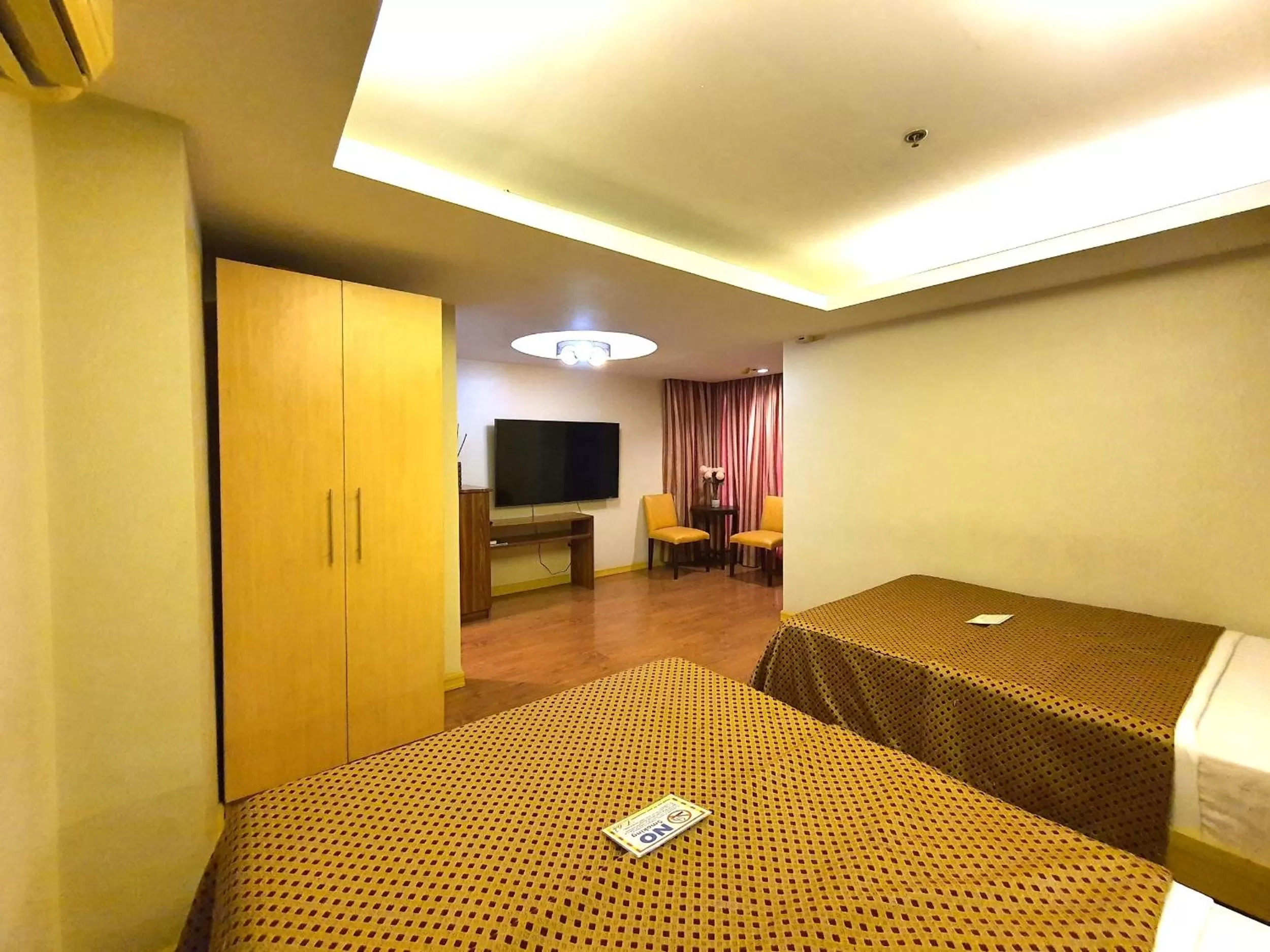 Bed in Festive Hotel Makati