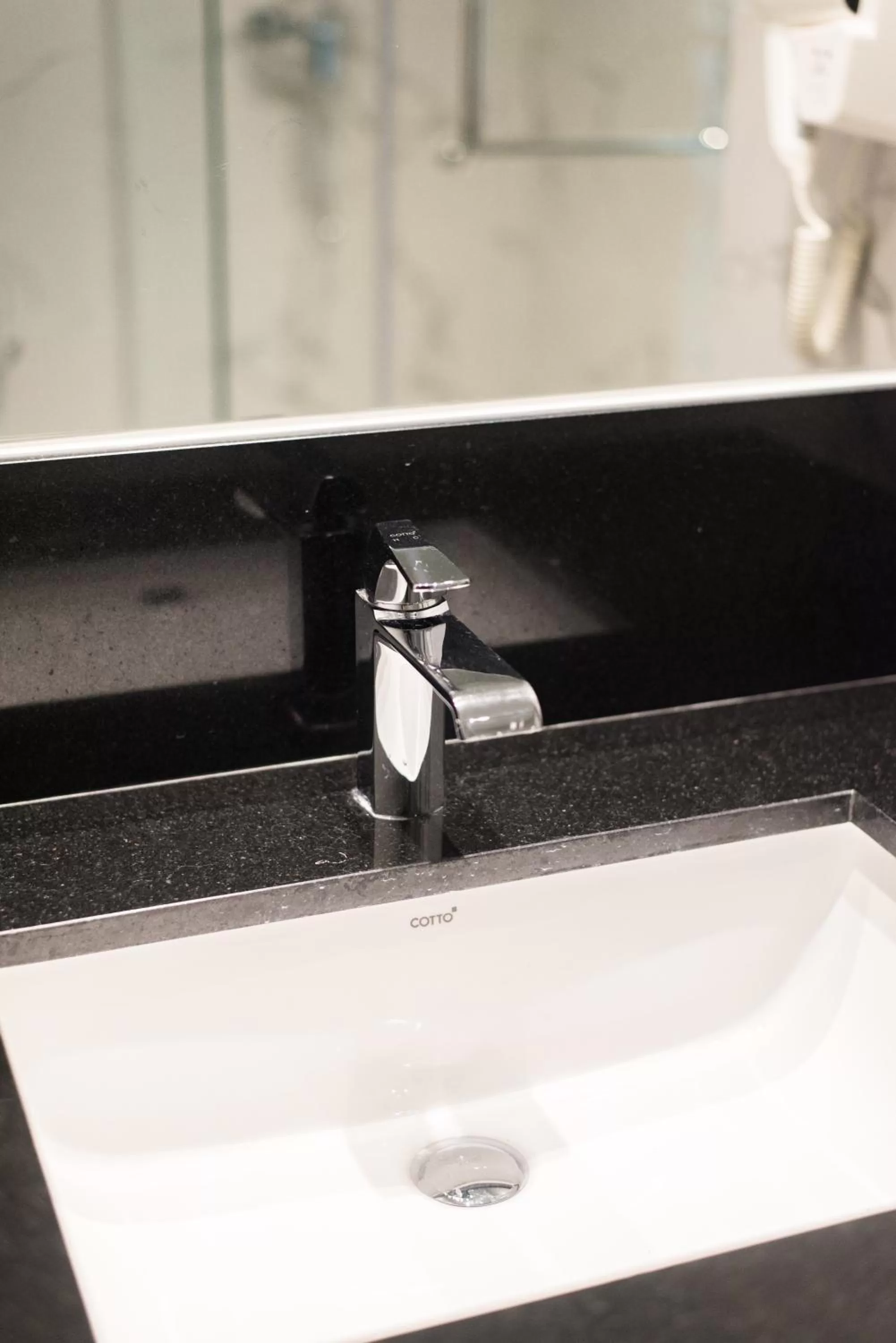 Bathroom in Madison Bangkok Hotel