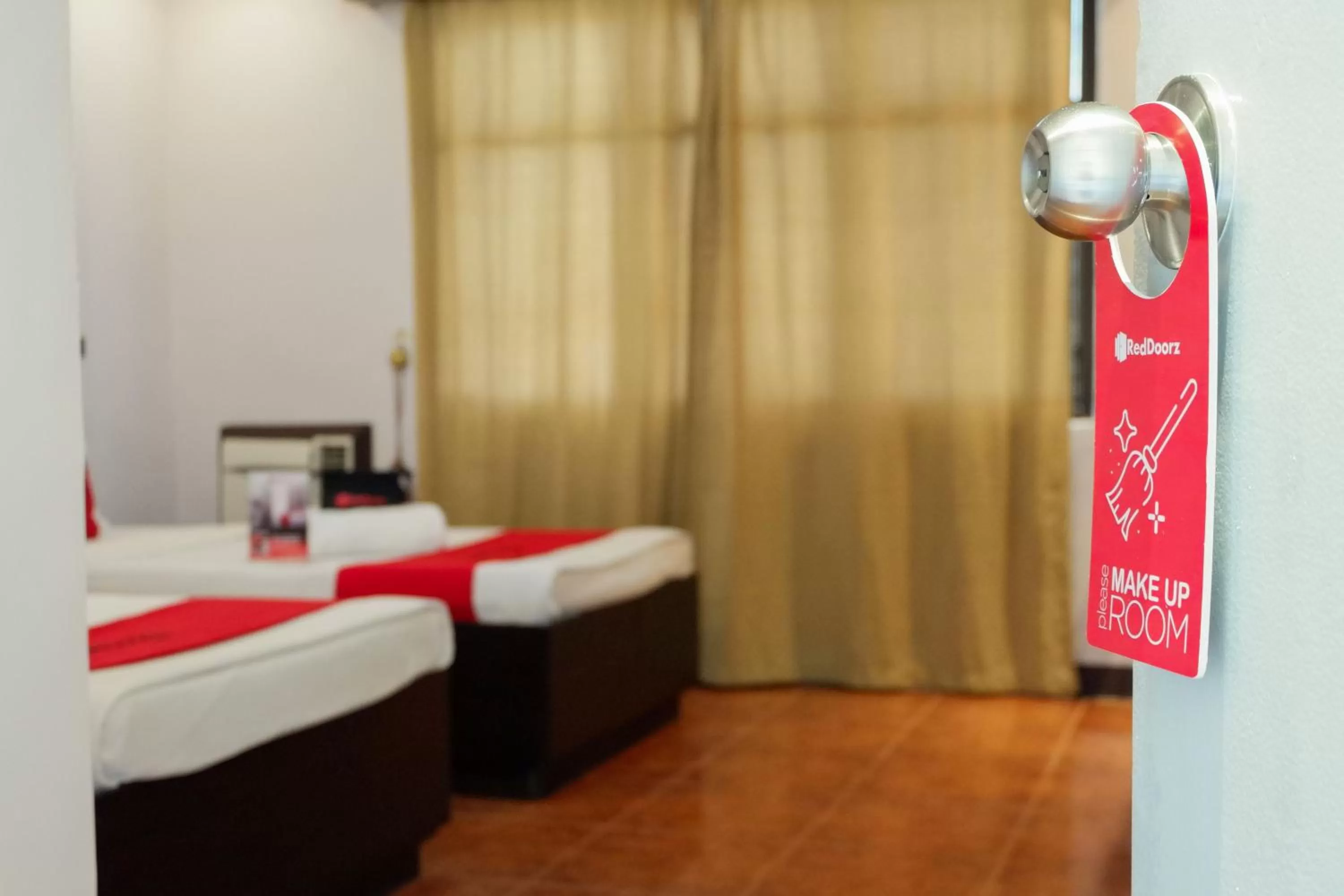 Bed in RedDoorz near Maribago Barangay Hall