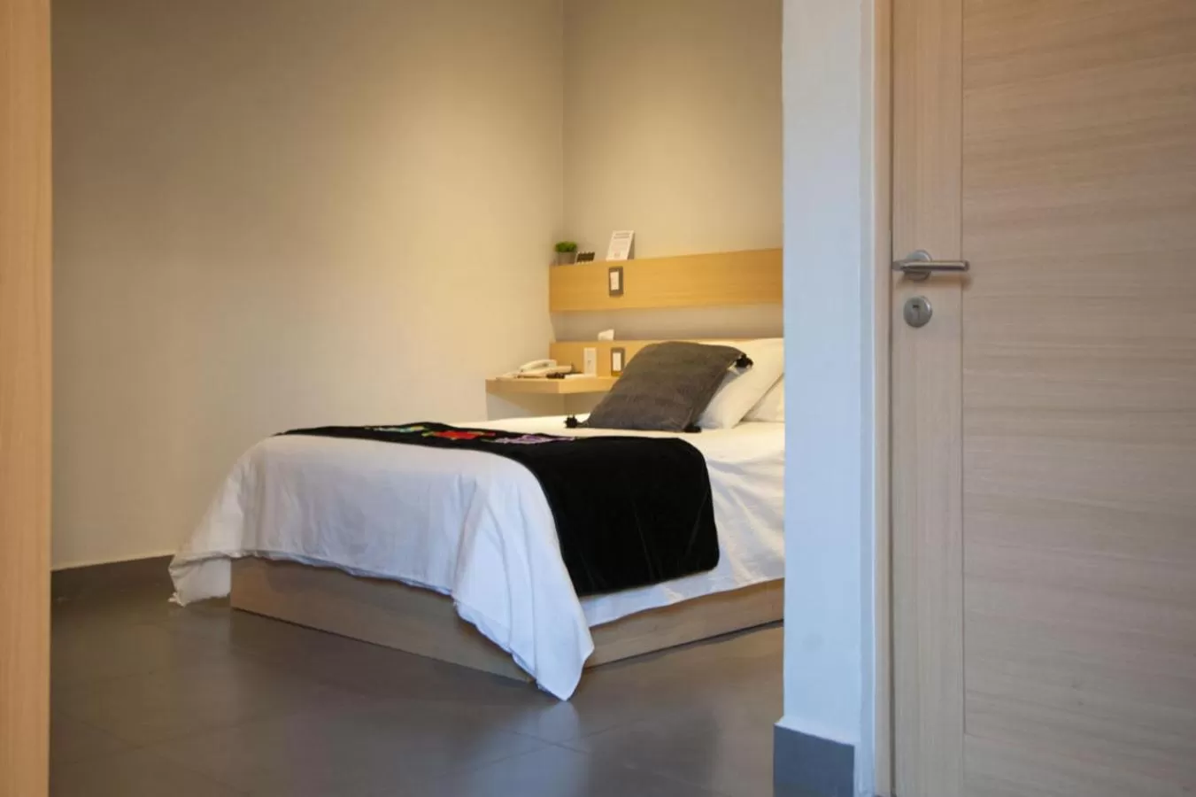 Bed in Maria Ines Hotel Suite