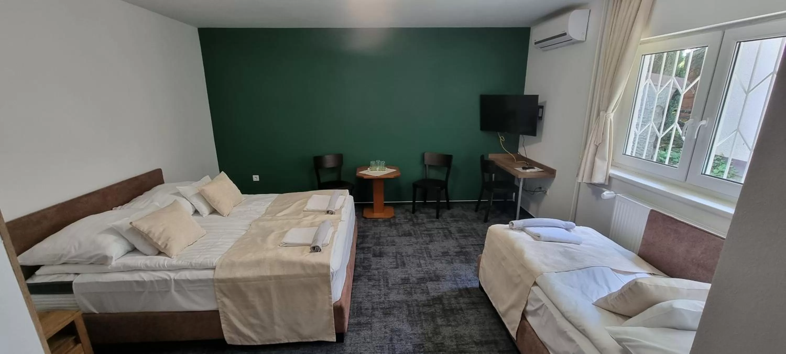 Bed, Seating Area in A Fogadó