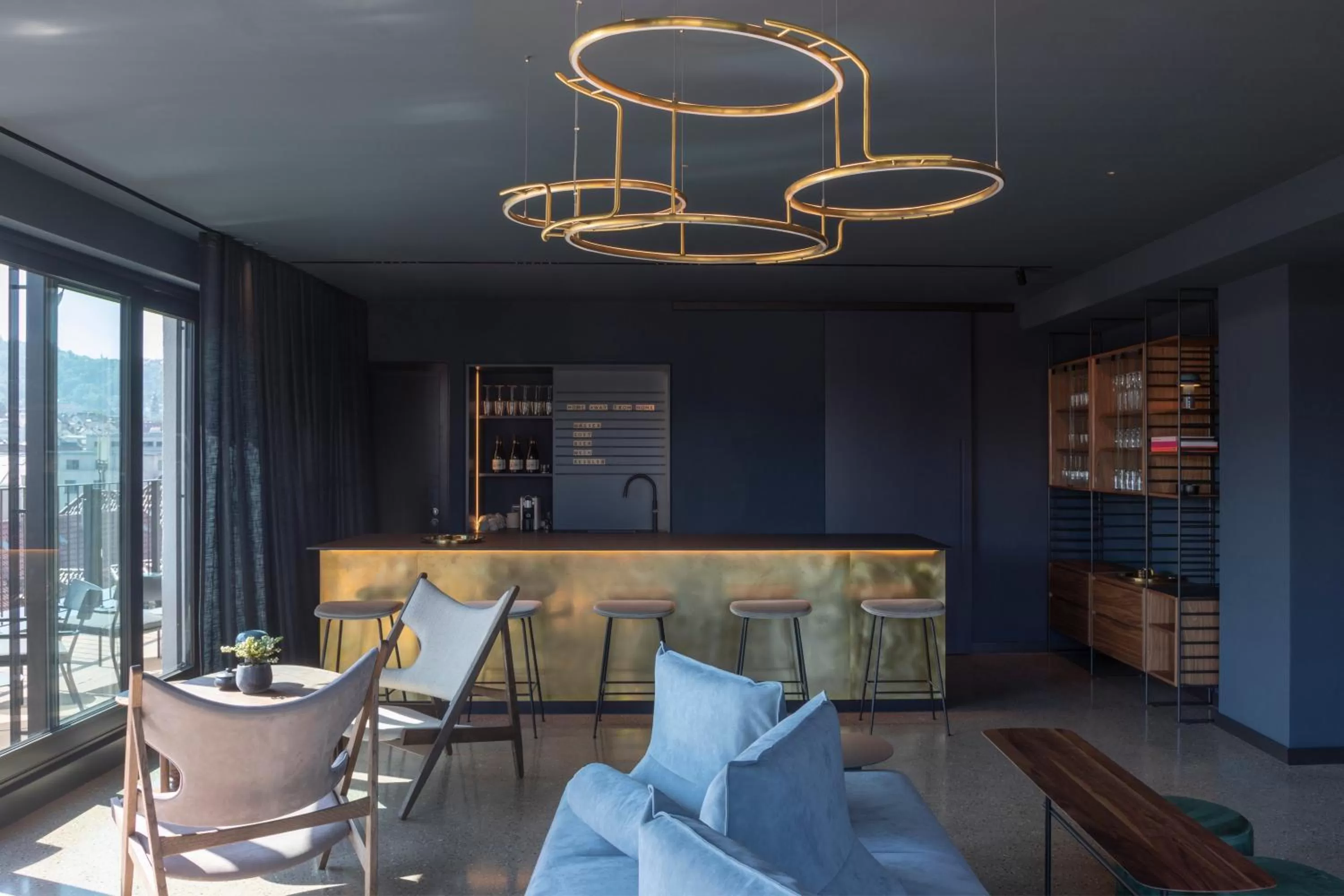 Communal lounge/ TV room in EmiLu Design Hotel