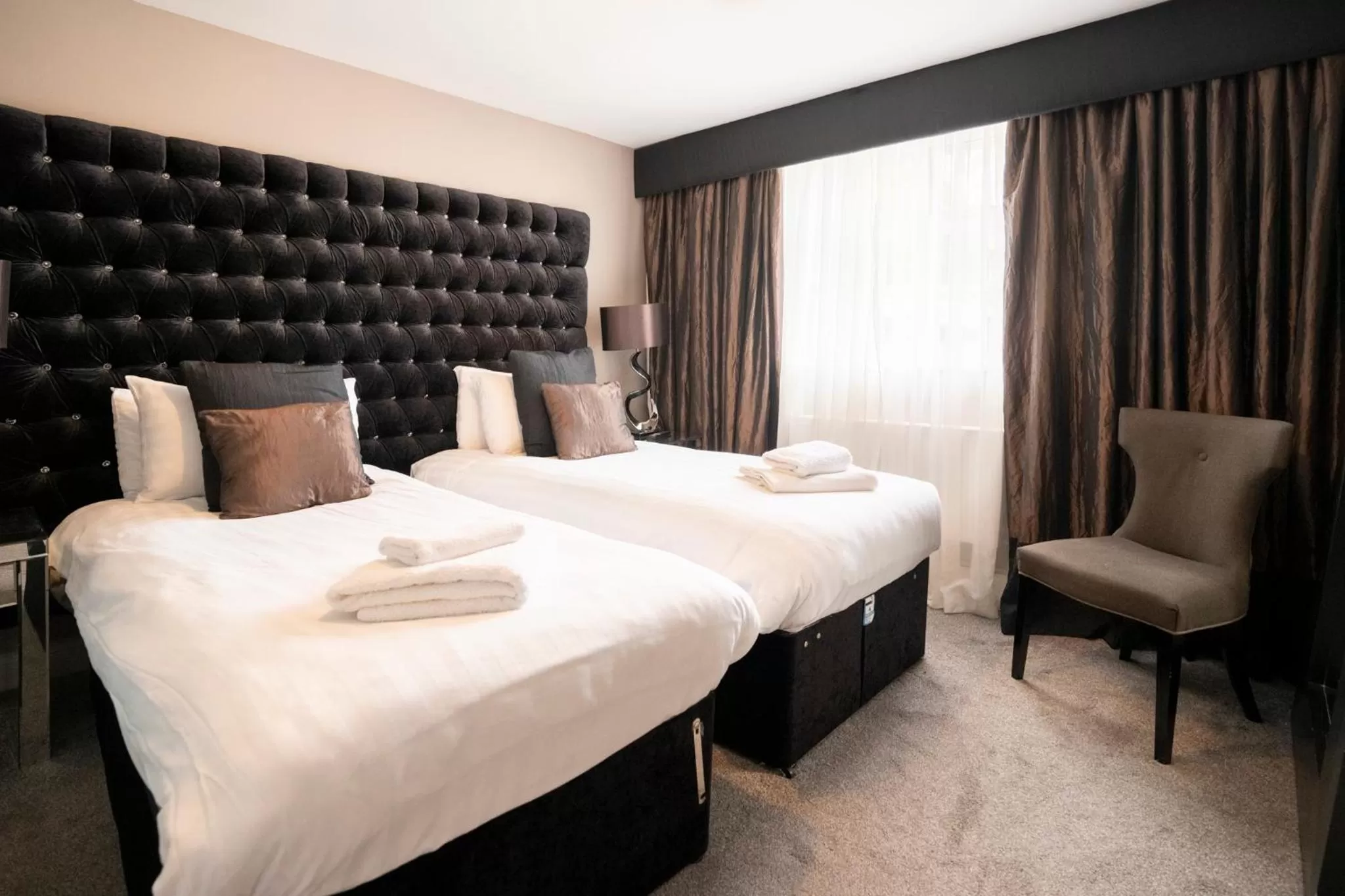 Bed in Derwent Manor Boutique Hotel