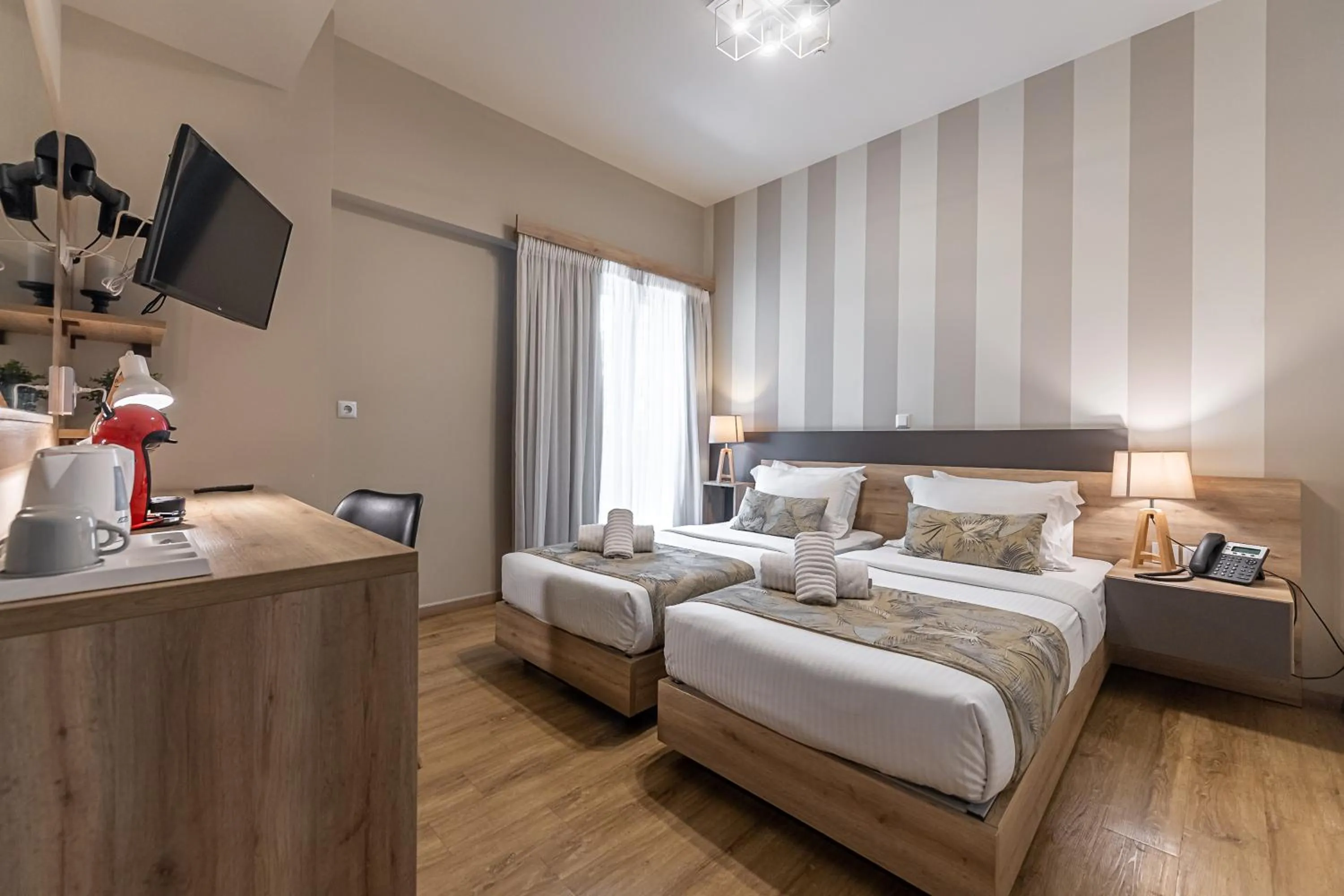 Bed in Hotel @Syngrou Fix