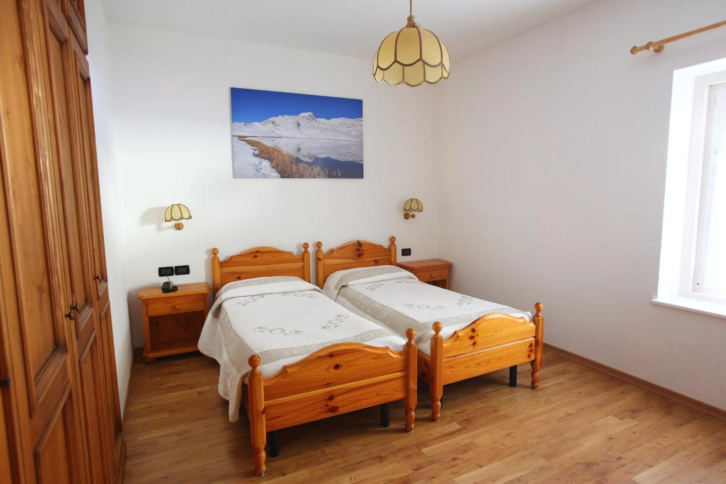 Bed in Hotel Des Alpes