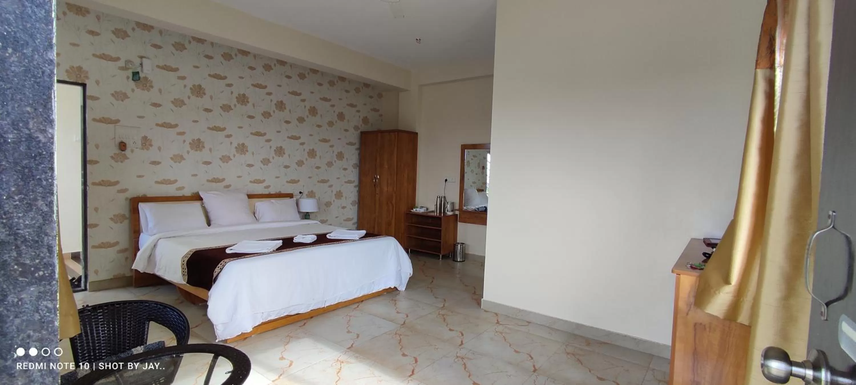 Bed in Mango Valley Resort Ganpatipule