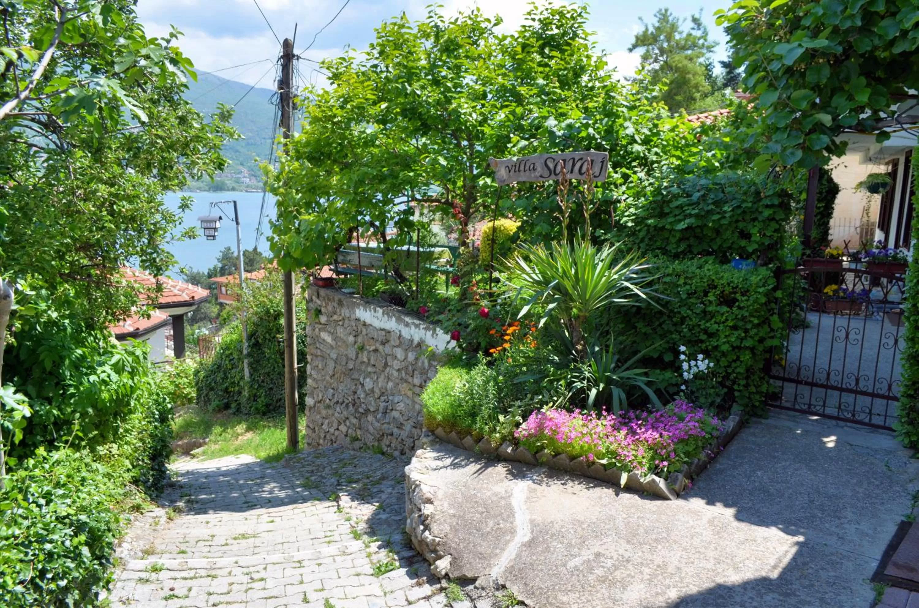 Facade/entrance, Garden in Apartments Villa Saray