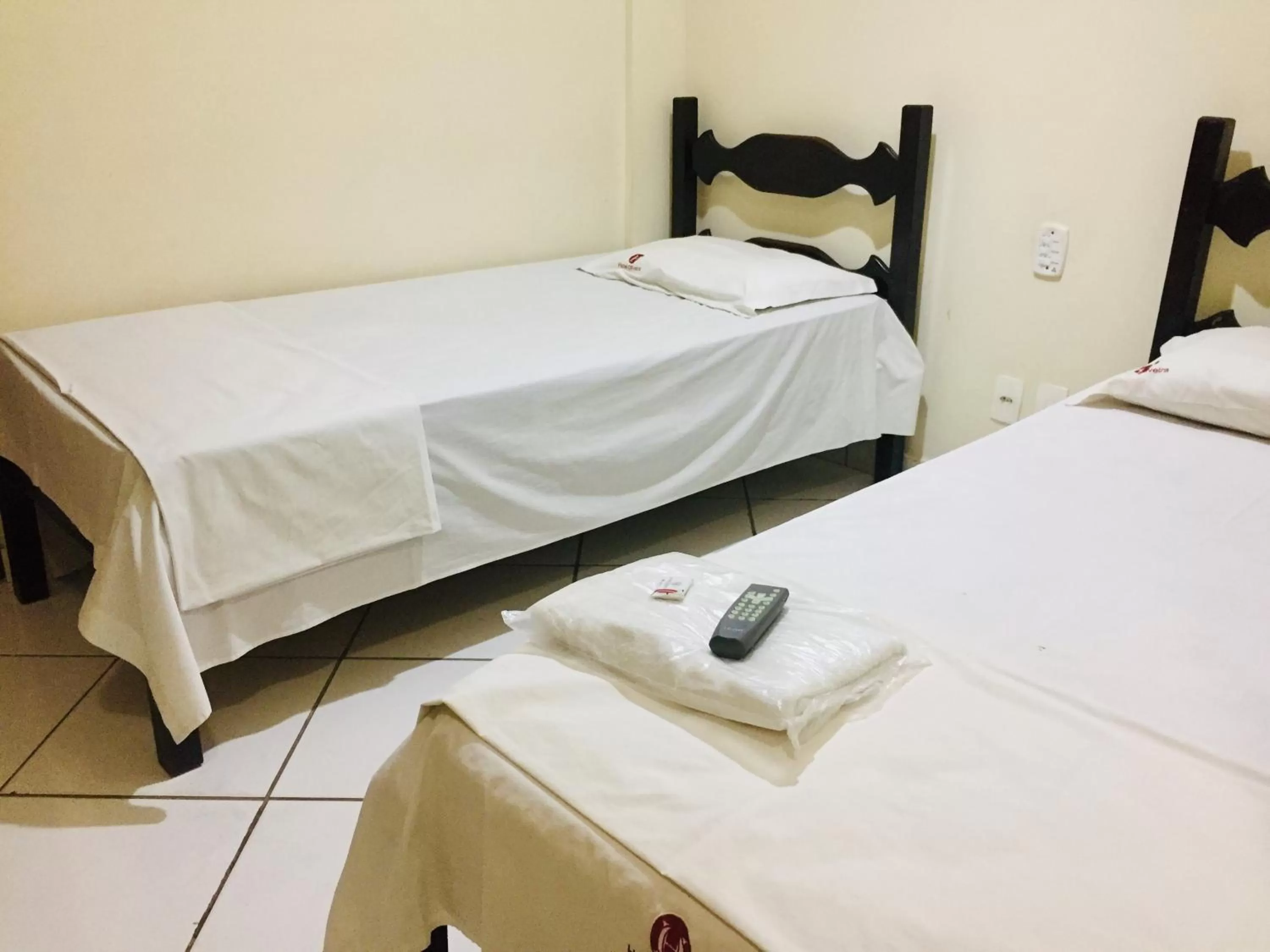 Bed in Hotel Oliveira