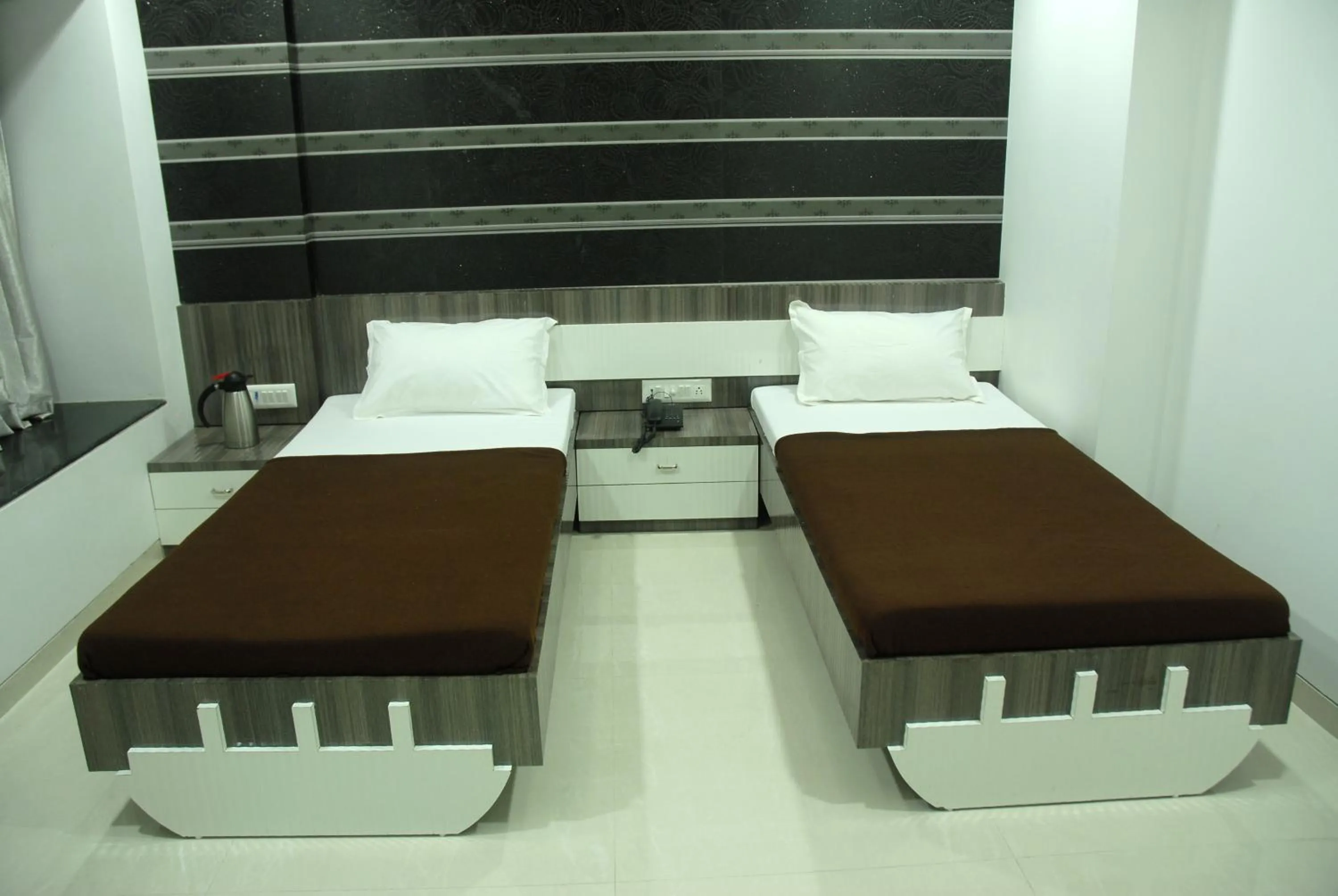 Bed in Hotel City View