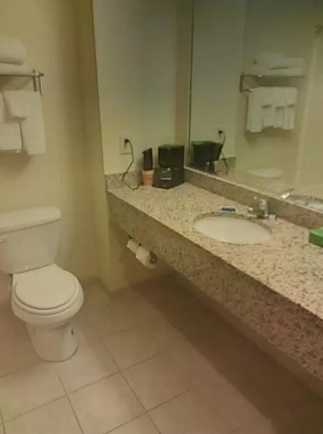 Bathroom in Days Inn by Wyndham Greensboro NC