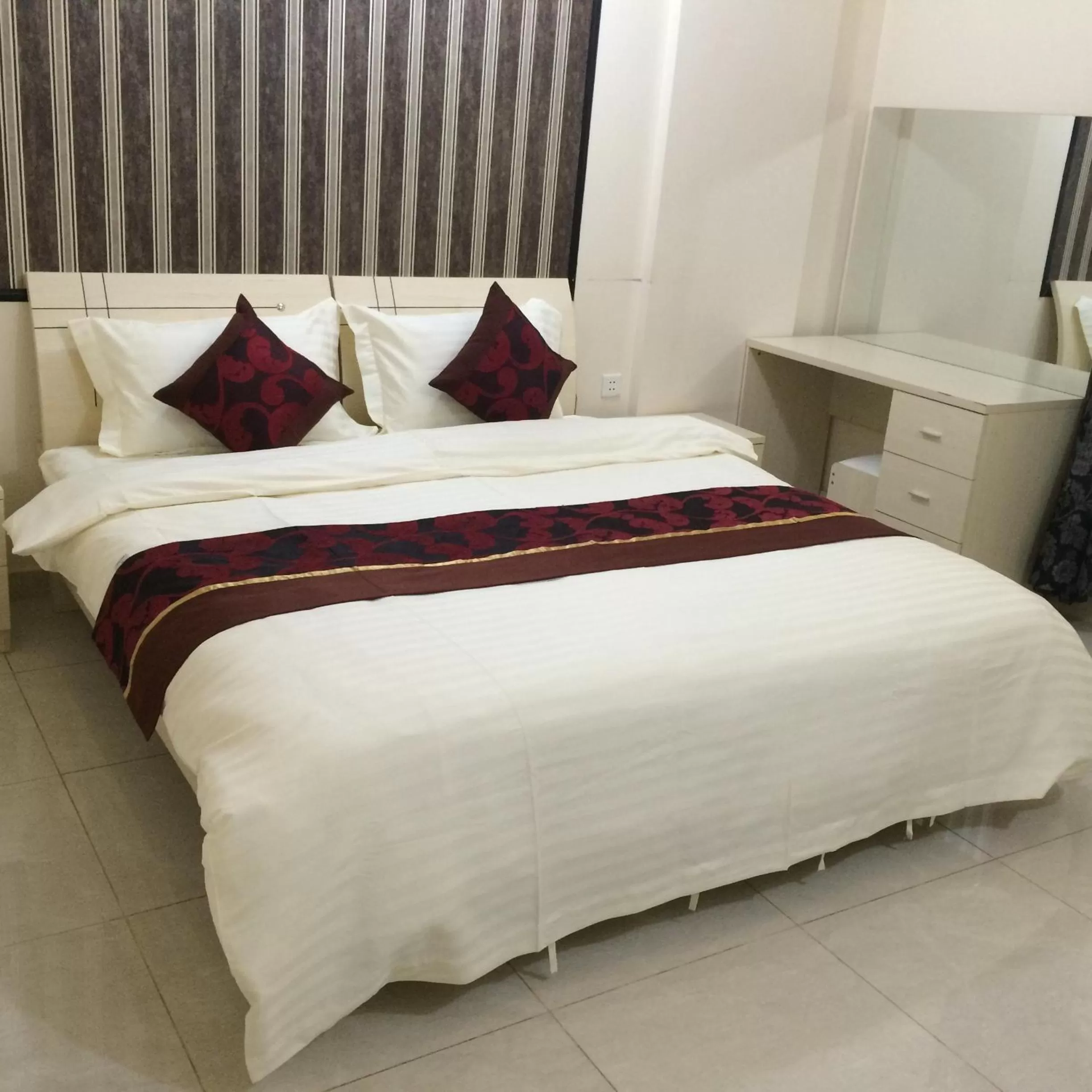 Bed in Al Amoria Apartments