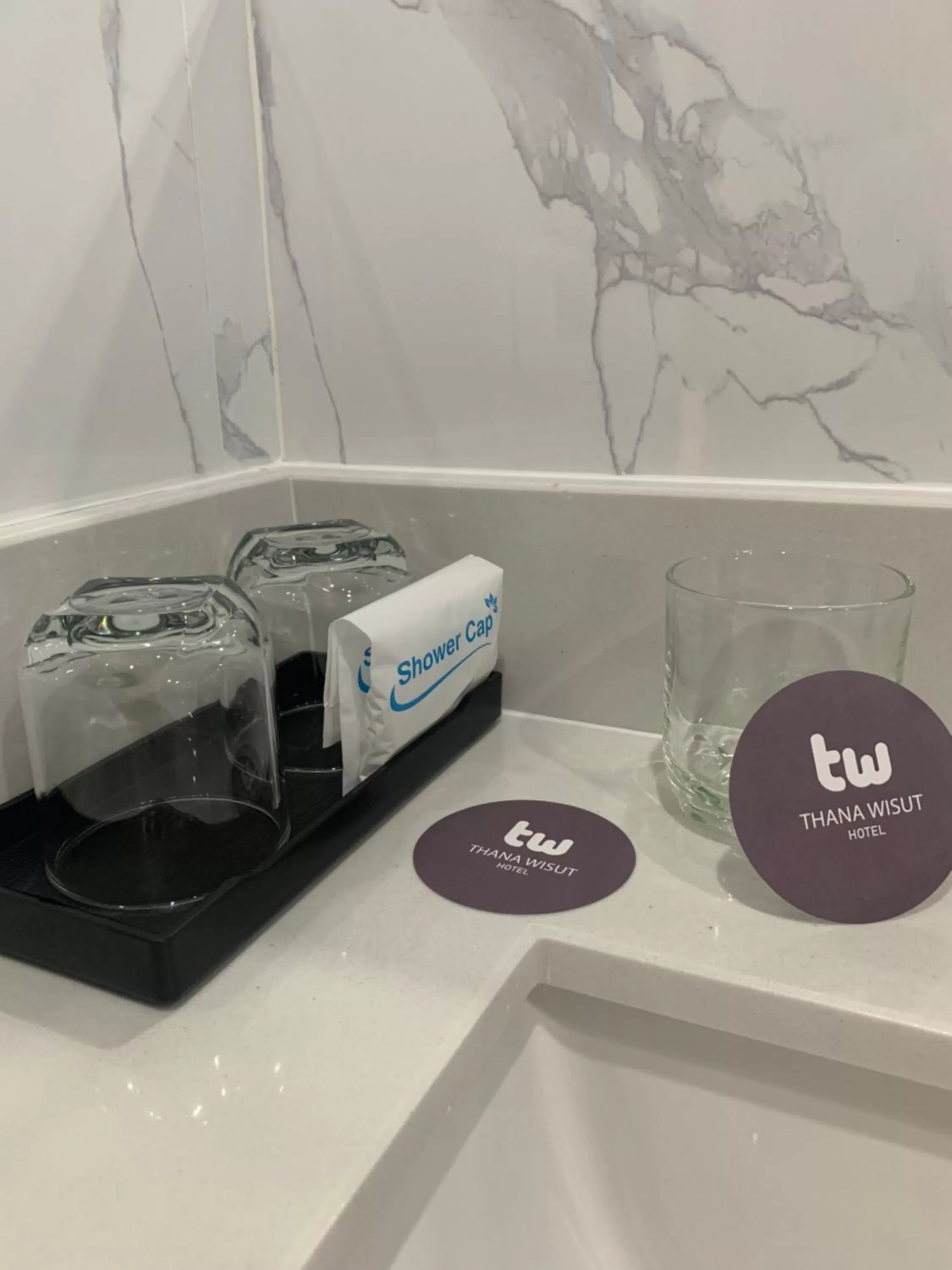 Bathroom in Thana Wisut Hotel