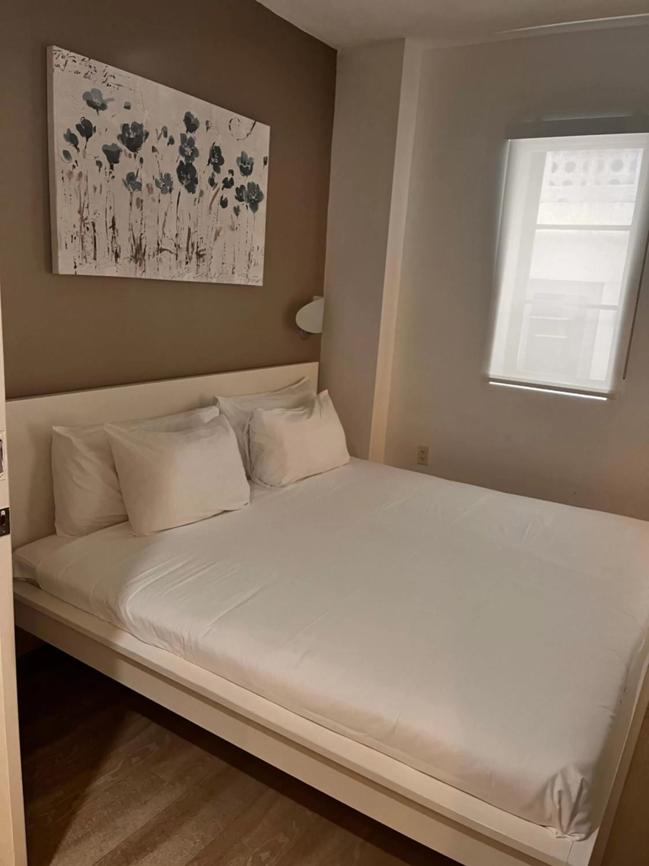 Bed in Suites at The Strand on Ocean Drive