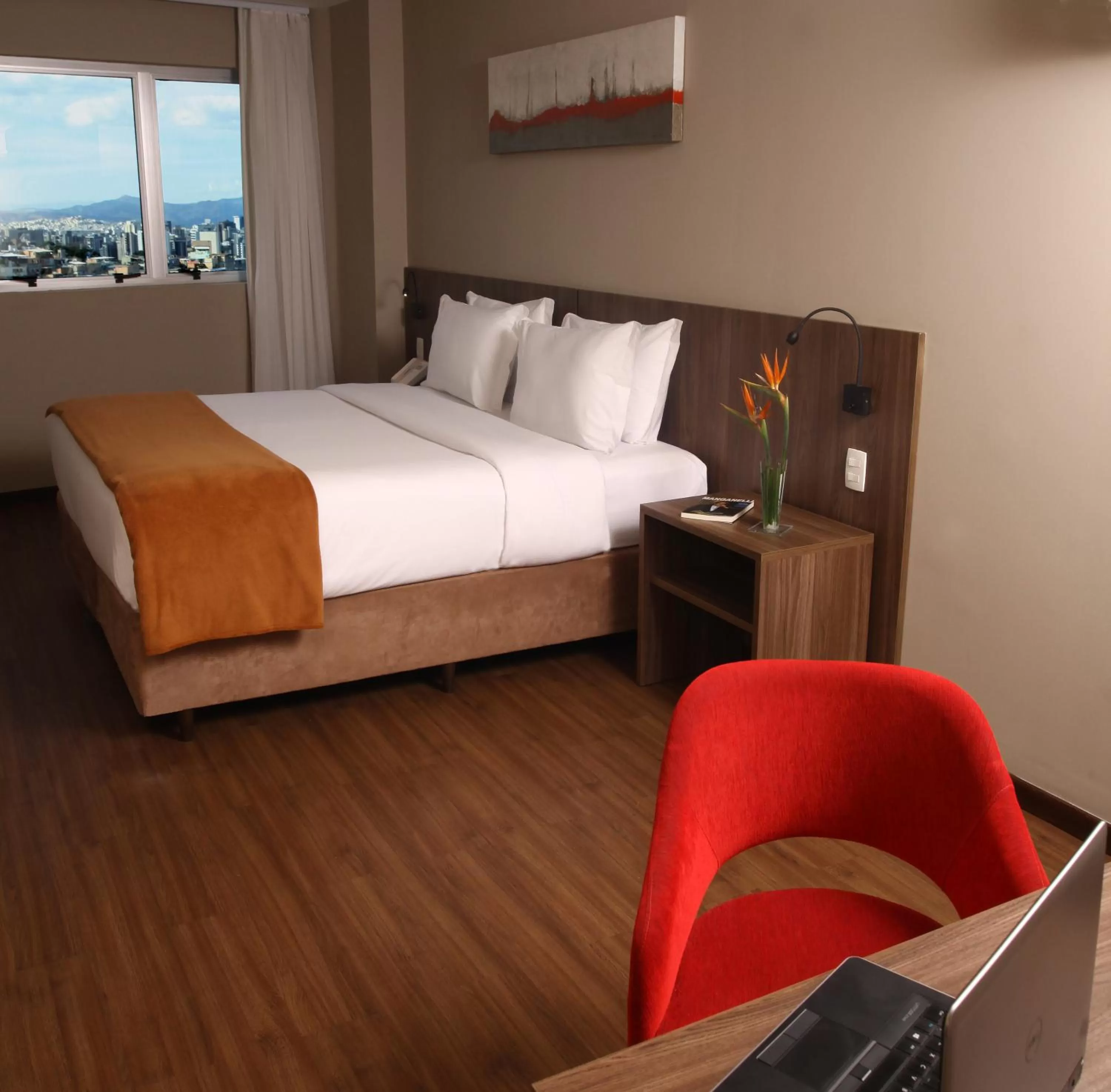 Photo of the whole room, Bed in BH Raja Hotel