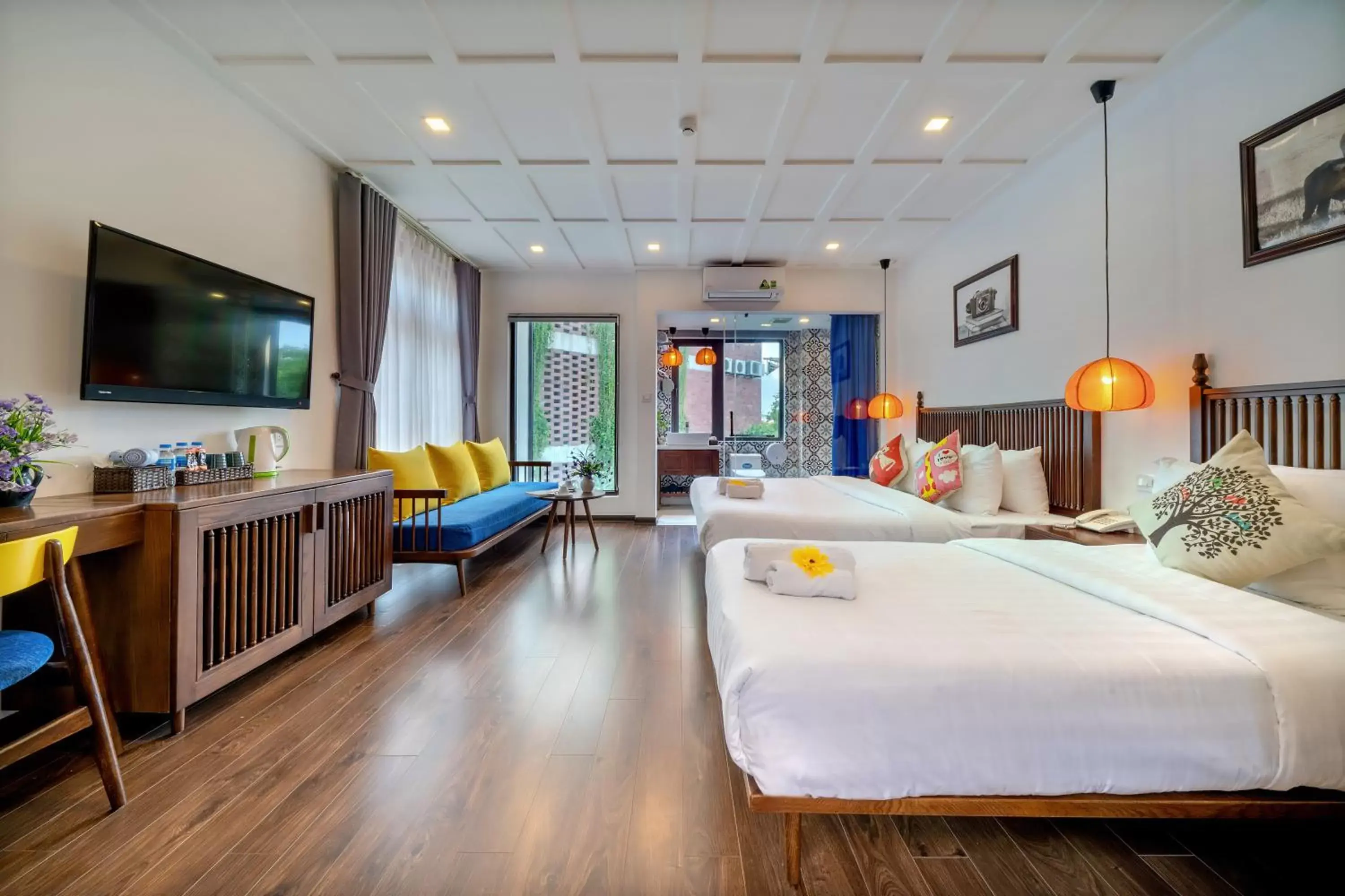 Luxury Triple Room with Garden View in Son Trang Hotel Hoi An Luxury Triple Room with Garden View in Son Trang Hotel Hoi An