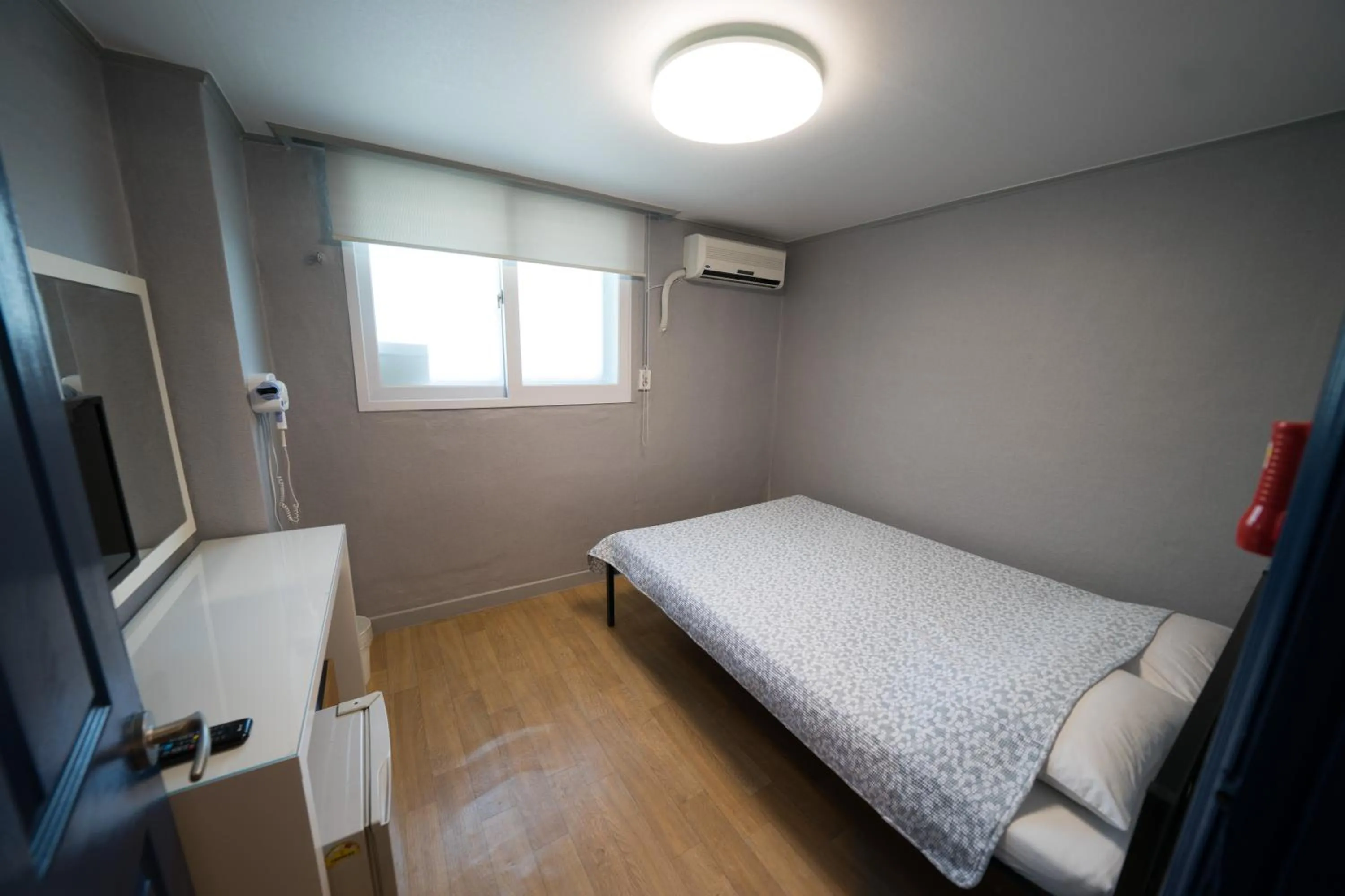 Bed in Beewon Guesthouse