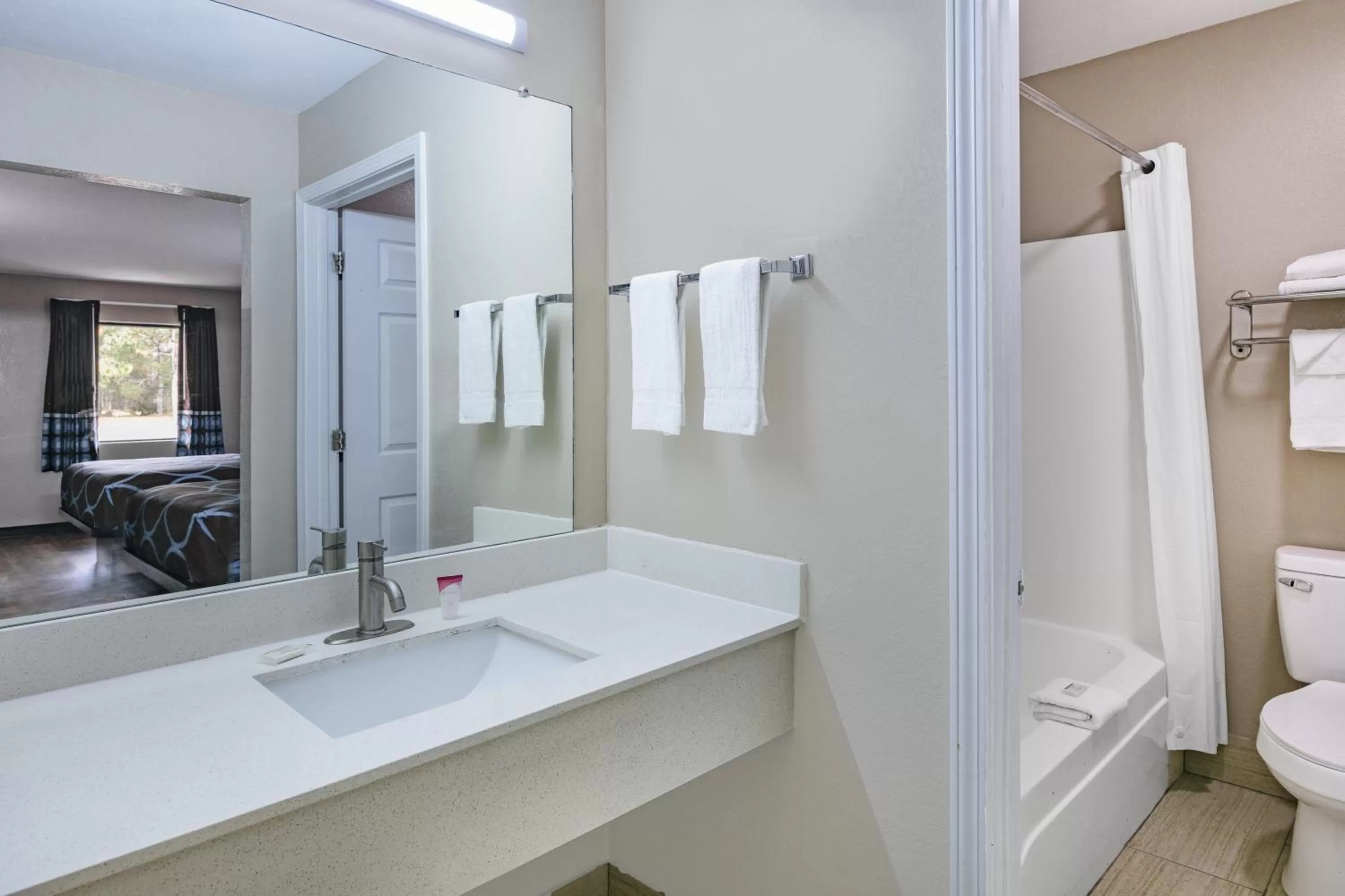 Bathroom in Super 8 by Wyndham Moss Point