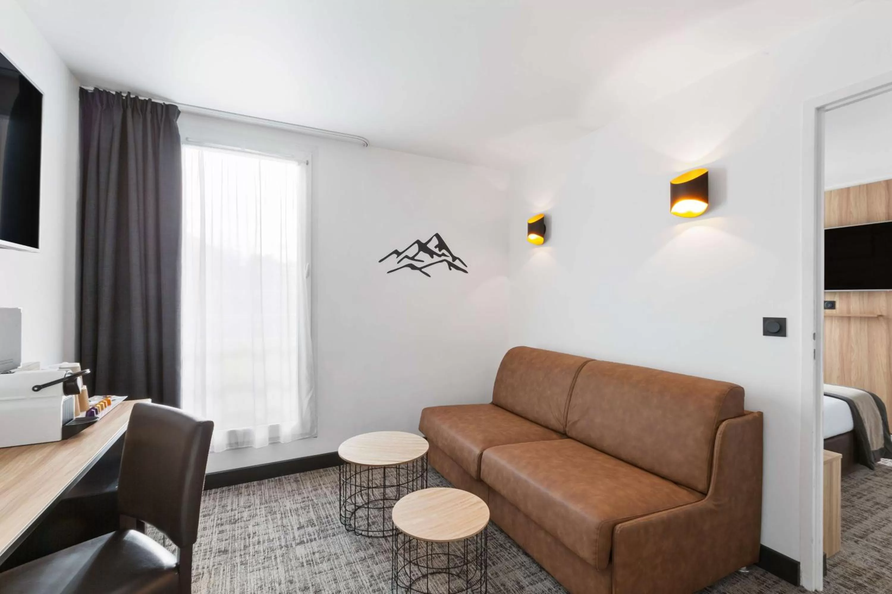 Photo of the whole room, Seating Area in Best Western Hôtel International