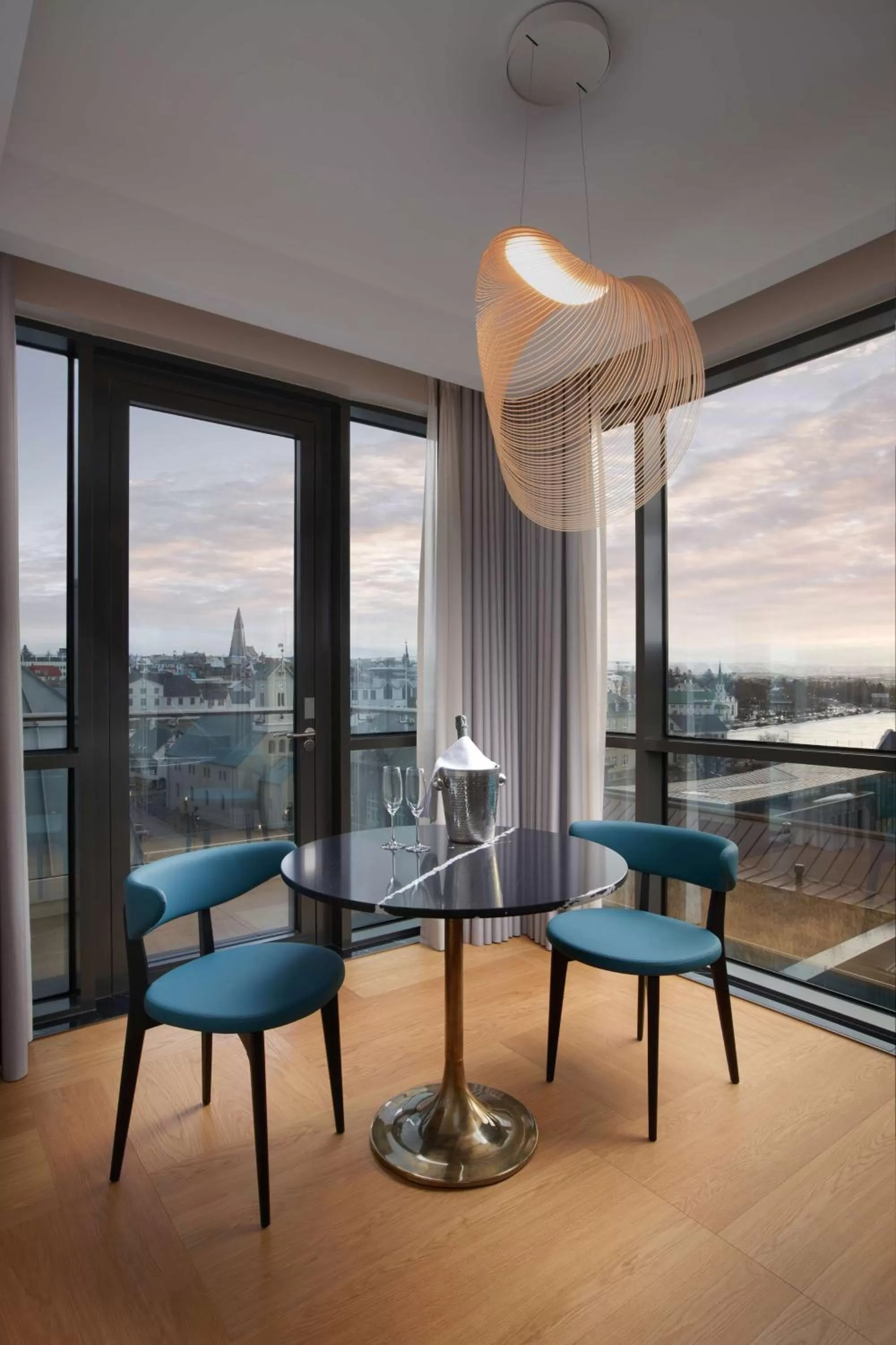 Living room in Iceland Parliament Hotel, Curio Collection By Hilton