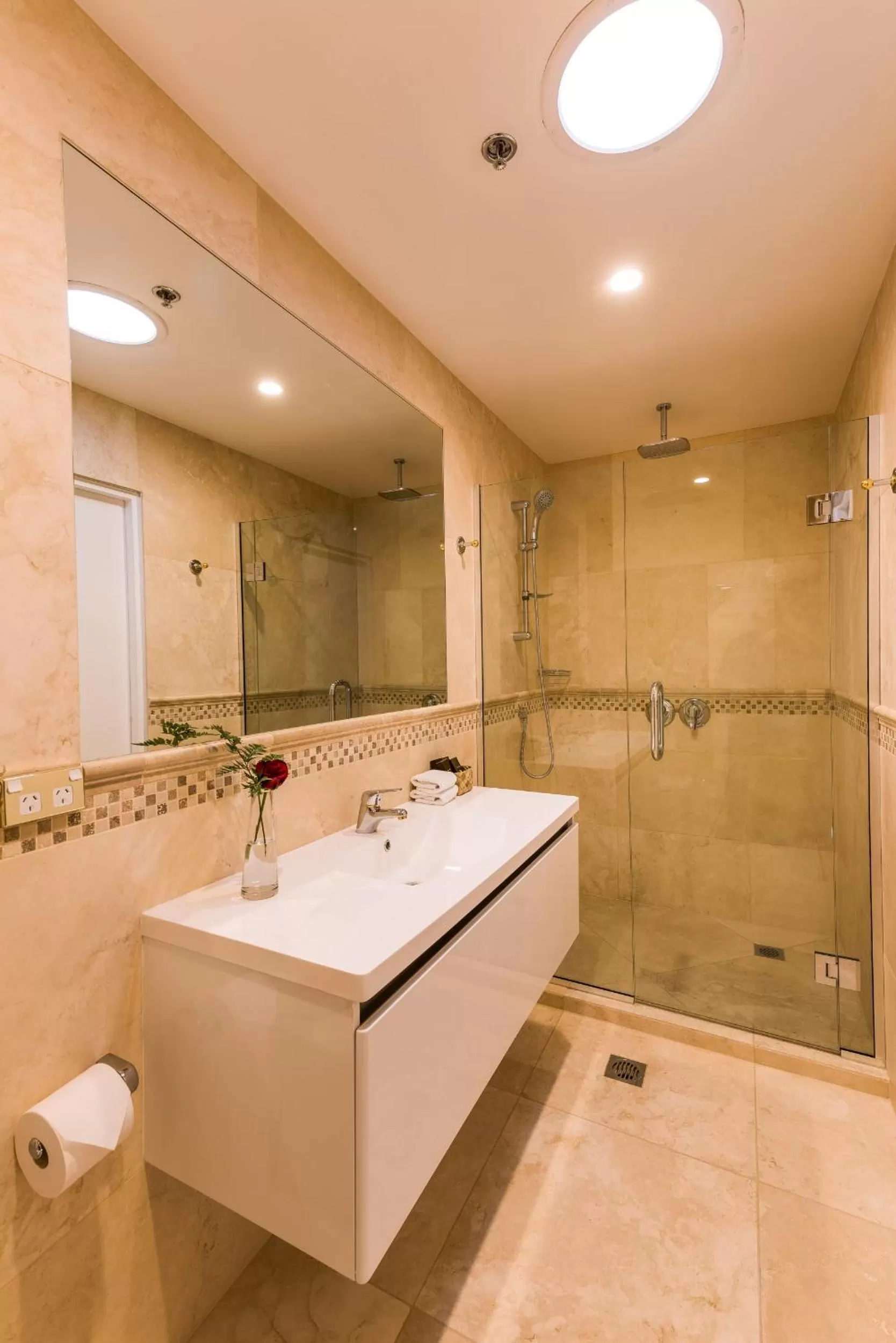 Bathroom in Fino Hotel & Suites