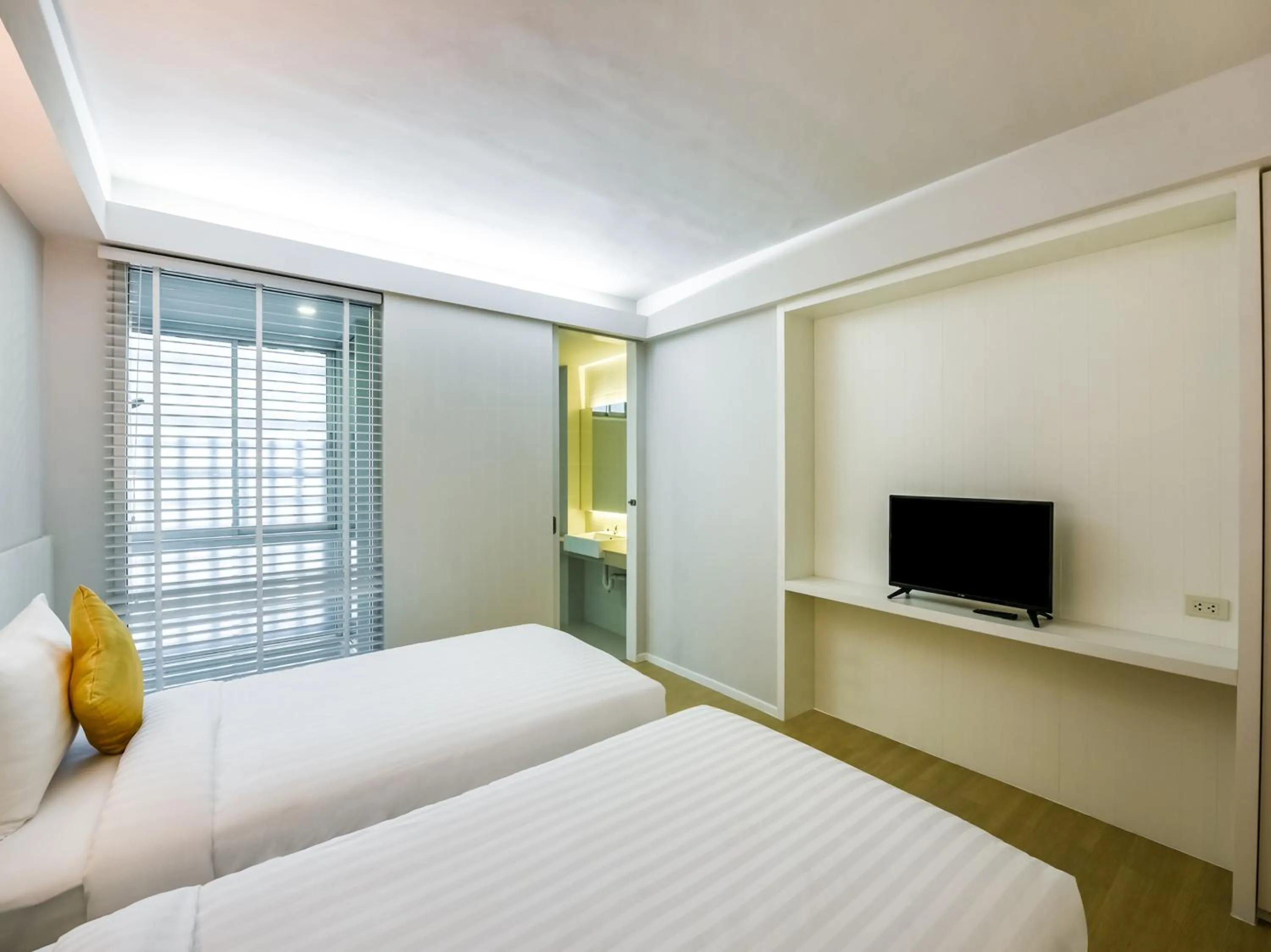 Bed in Kitzio House Hotel Huai Kwang