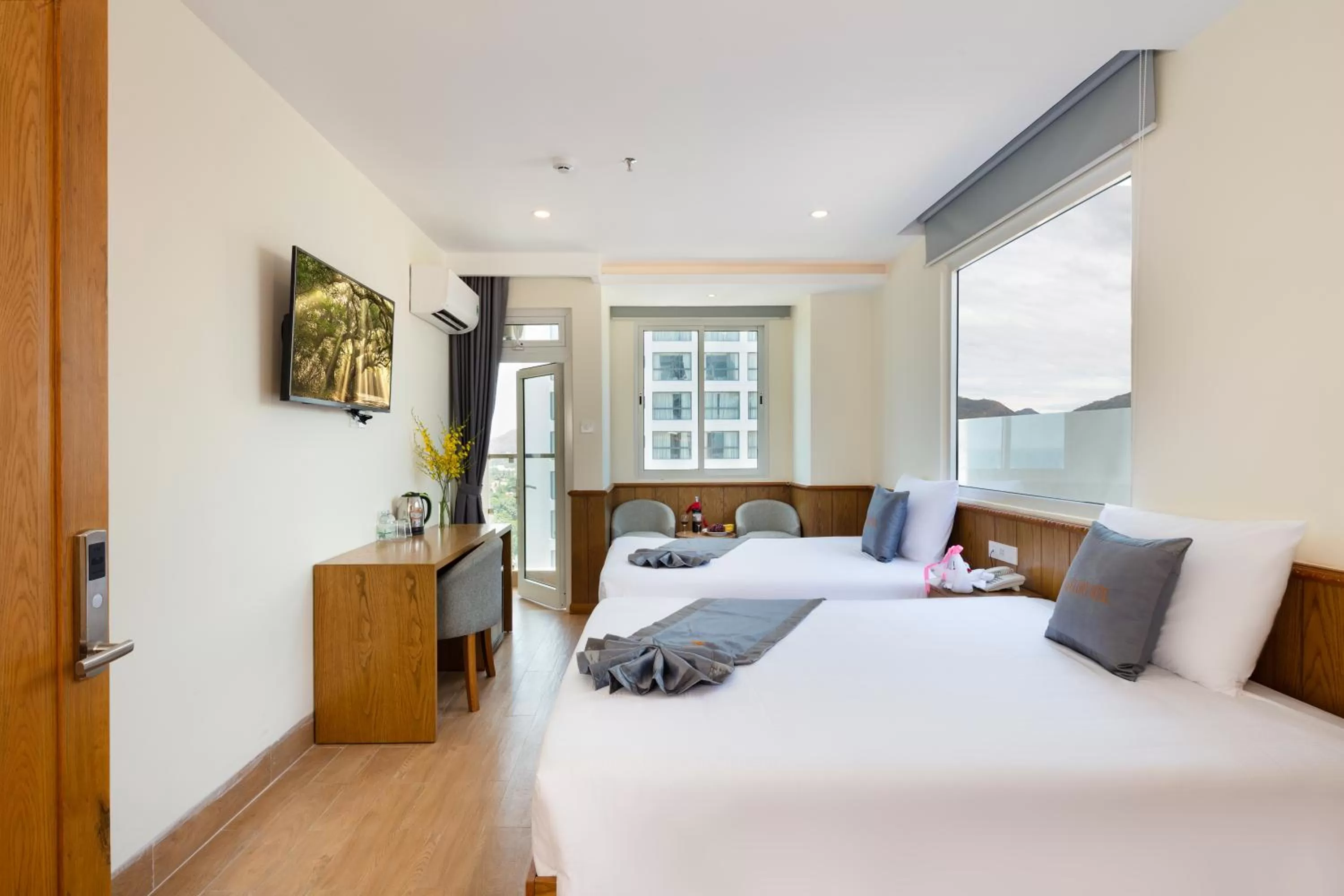 Photo of the whole room, Bed in Glory Nha Trang Hotel