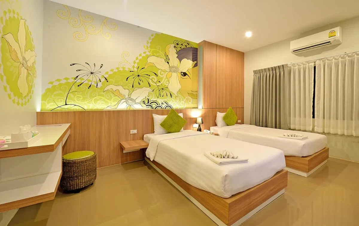 Bed in Tairada Boutique Hotel