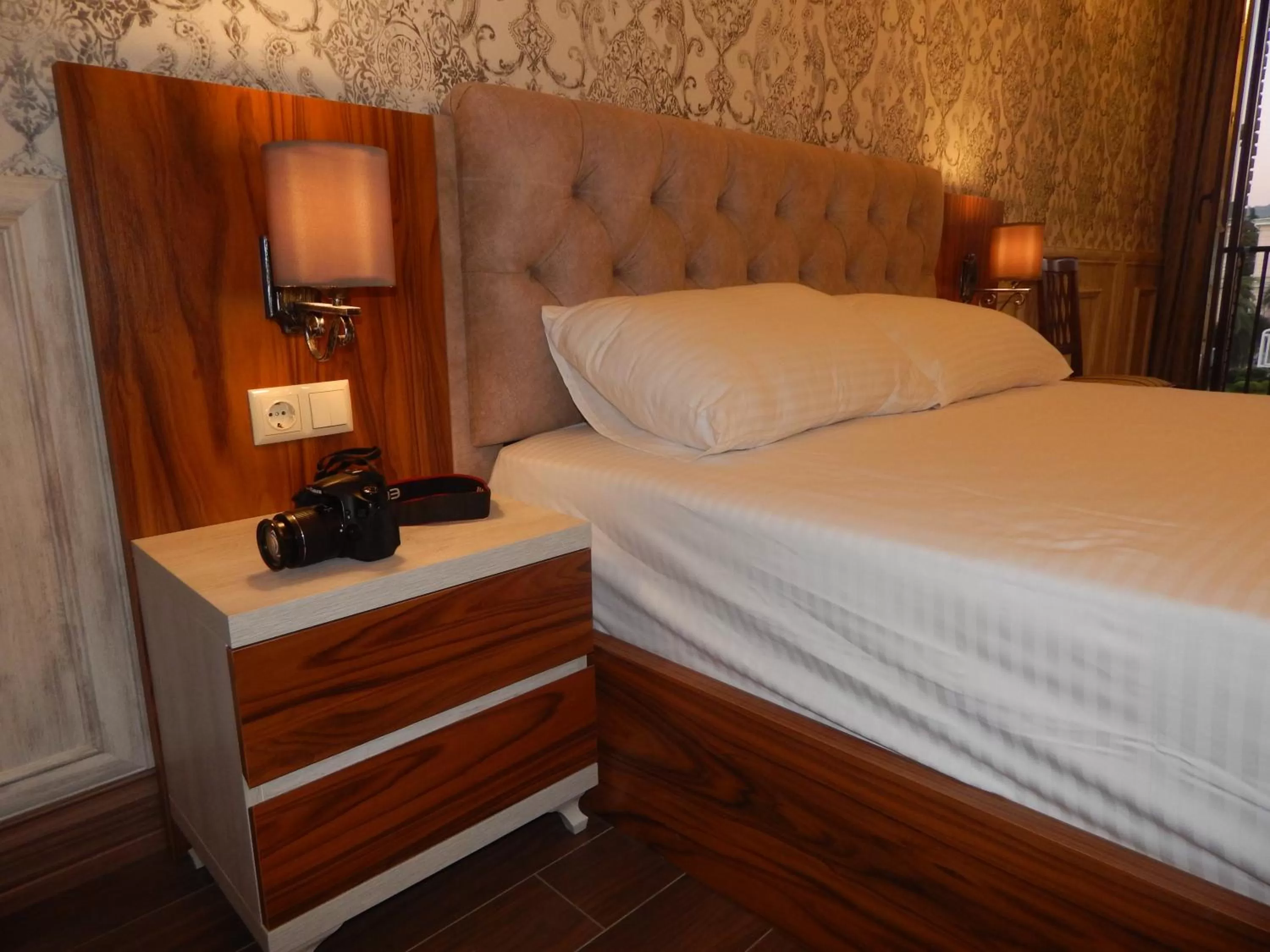 Bed in MELINI Boutique Hotel