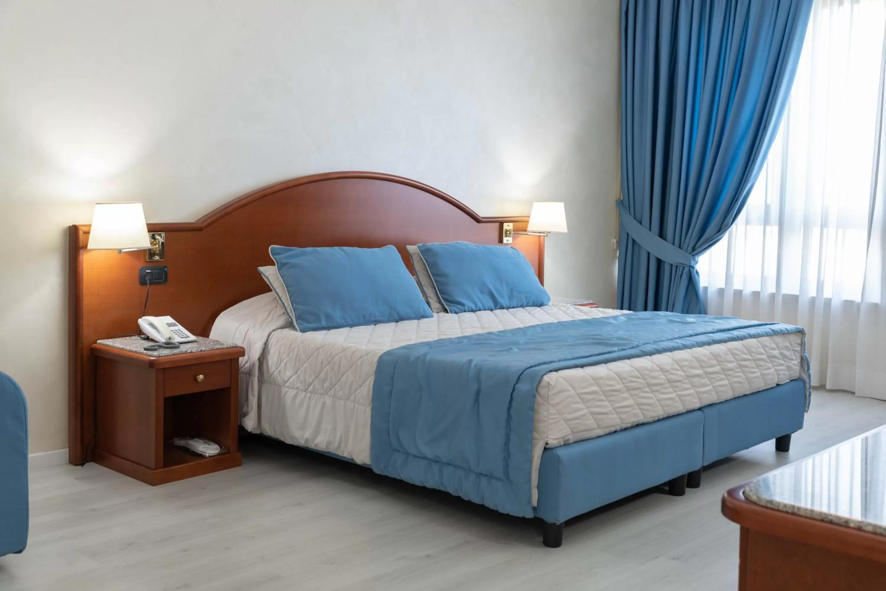 Bed in Edra Palace Hotel & Ristorante
