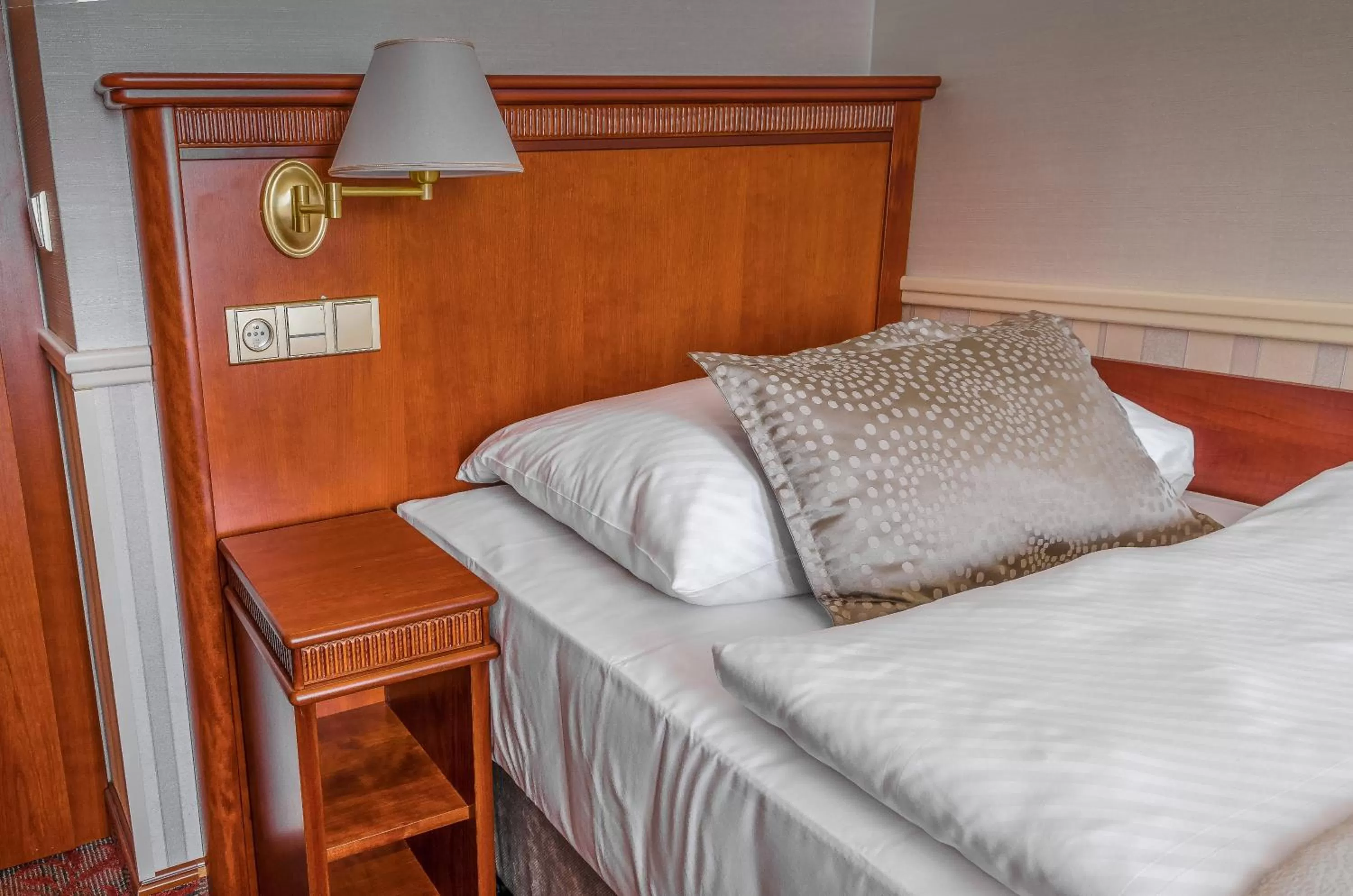 Bed in Adria Hotel Prague