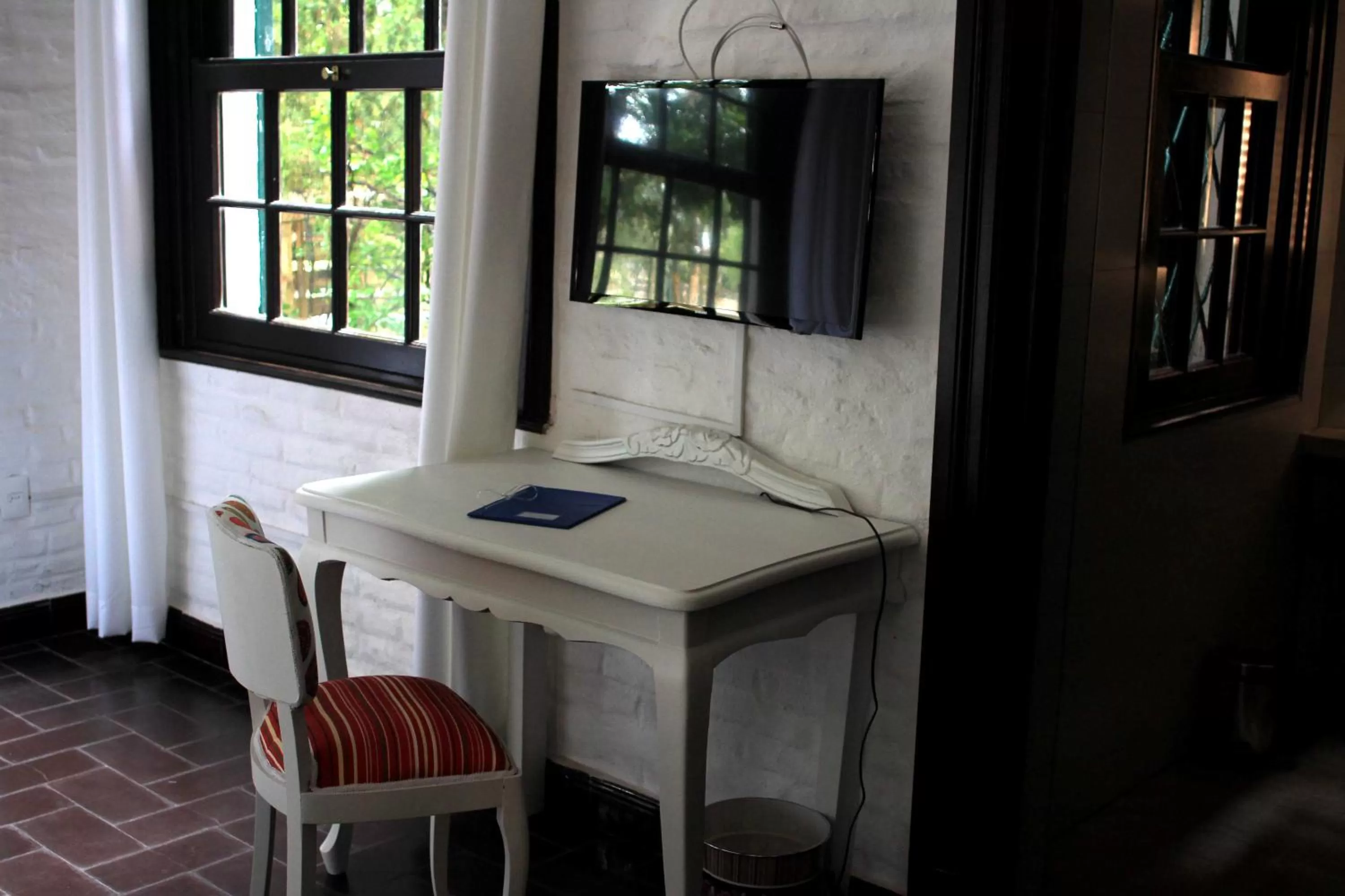 TV and multimedia in Santoral Restaurante y Posada Pet Friendly