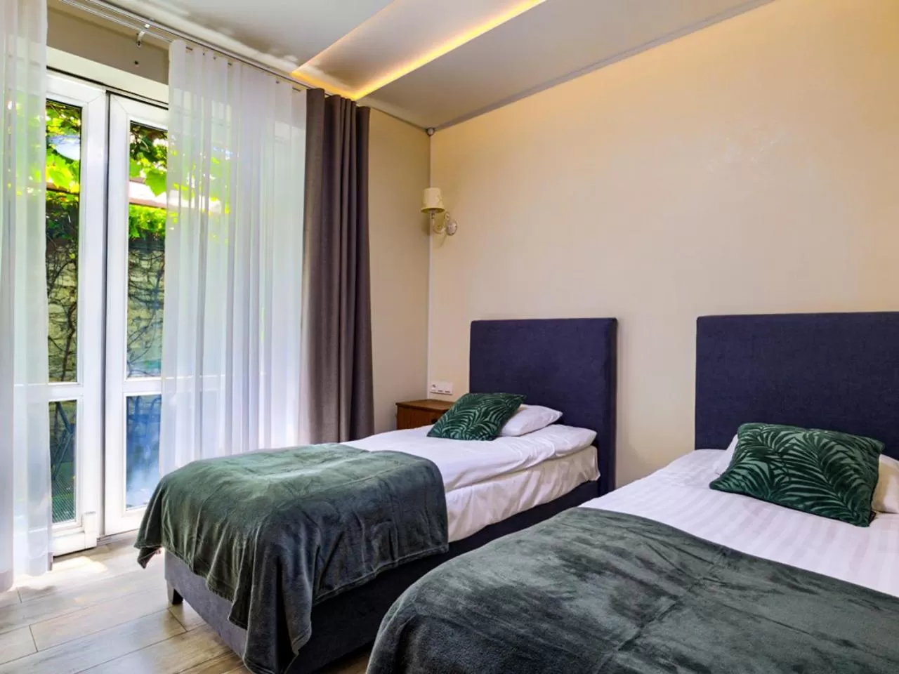 Bed in GRONO Apartamenty