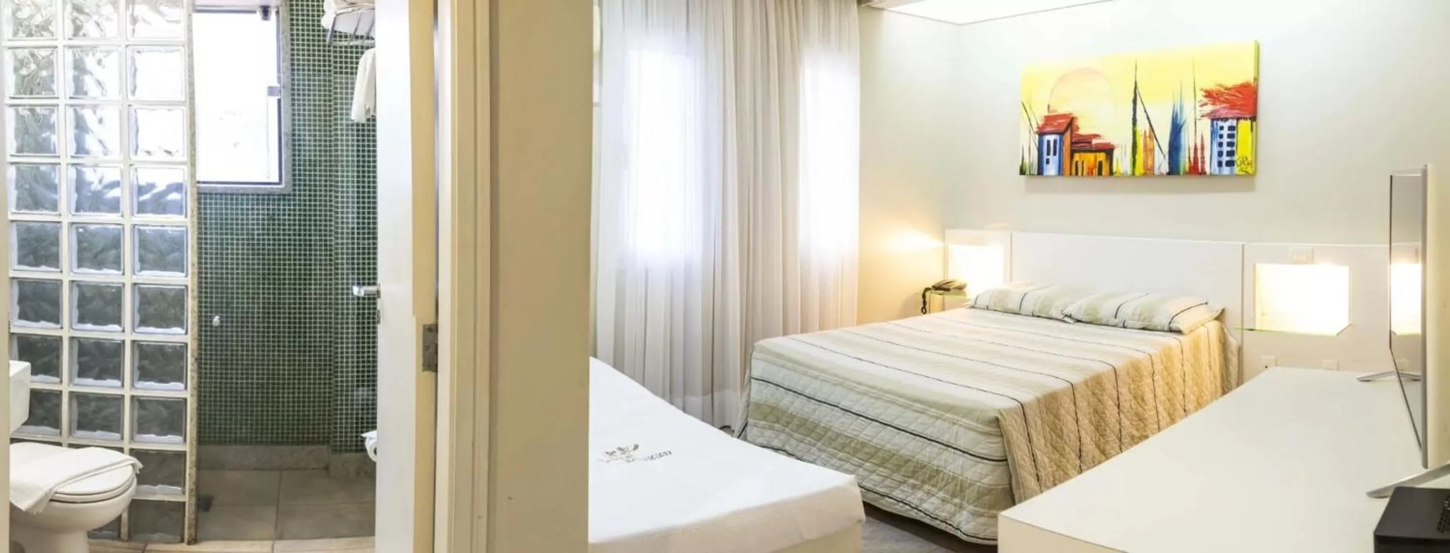 Bed in VOA Plazza Hotel