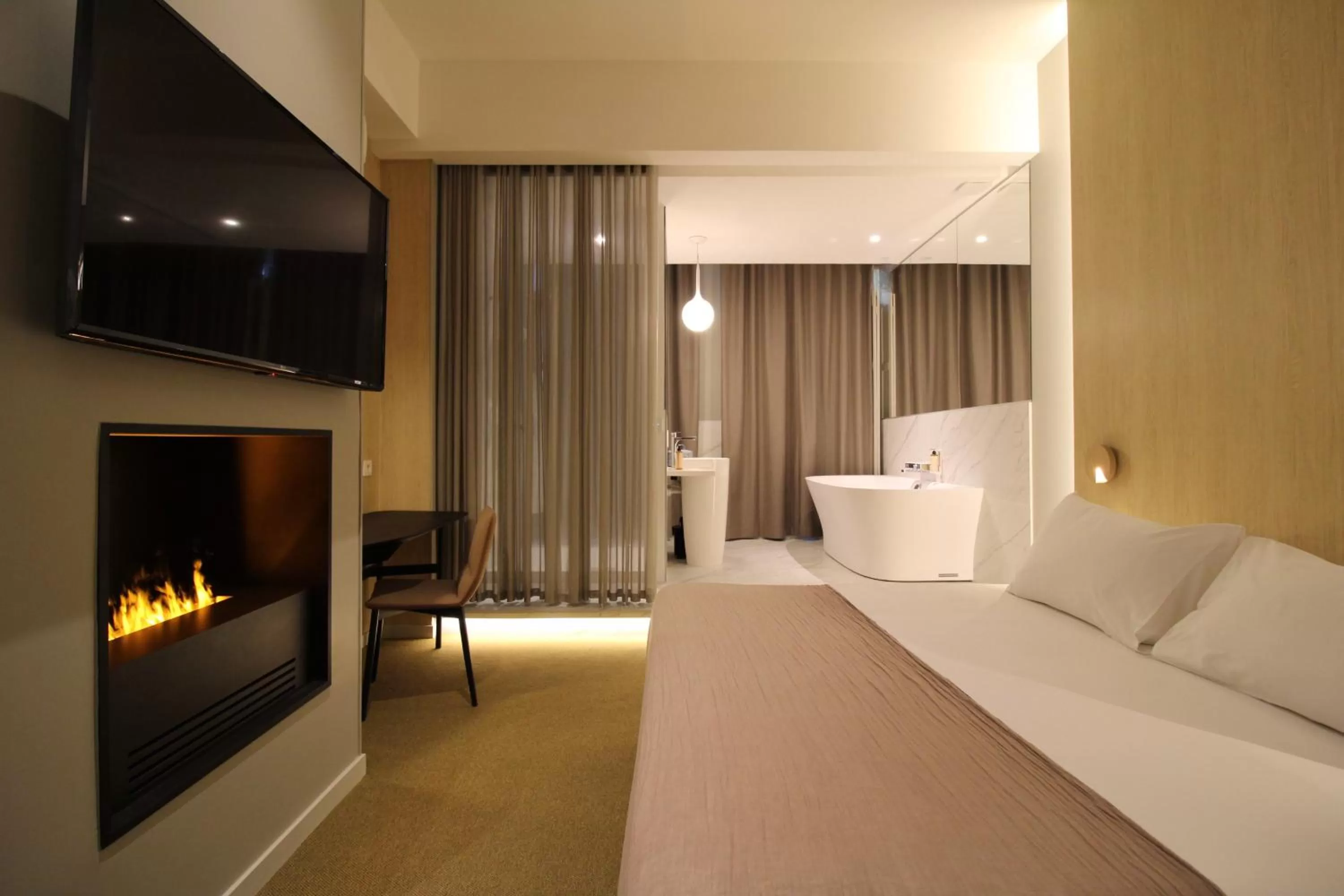 Photo of the whole room, TV/Entertainment Center in MiHotel Sala