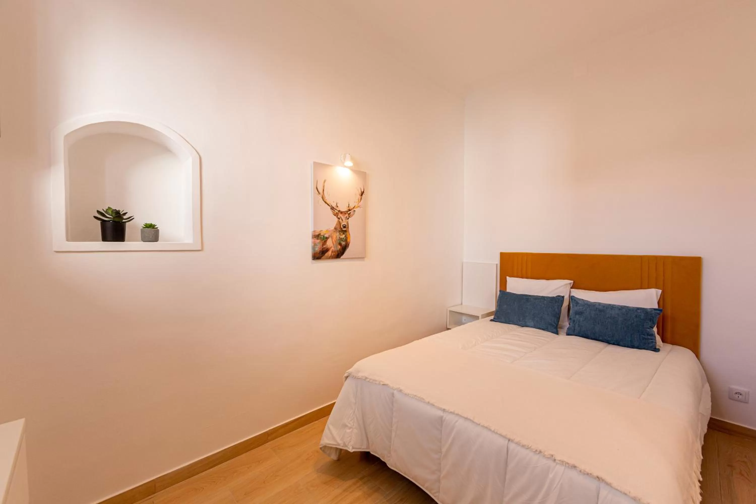 Bed in Luxury Palm Suites