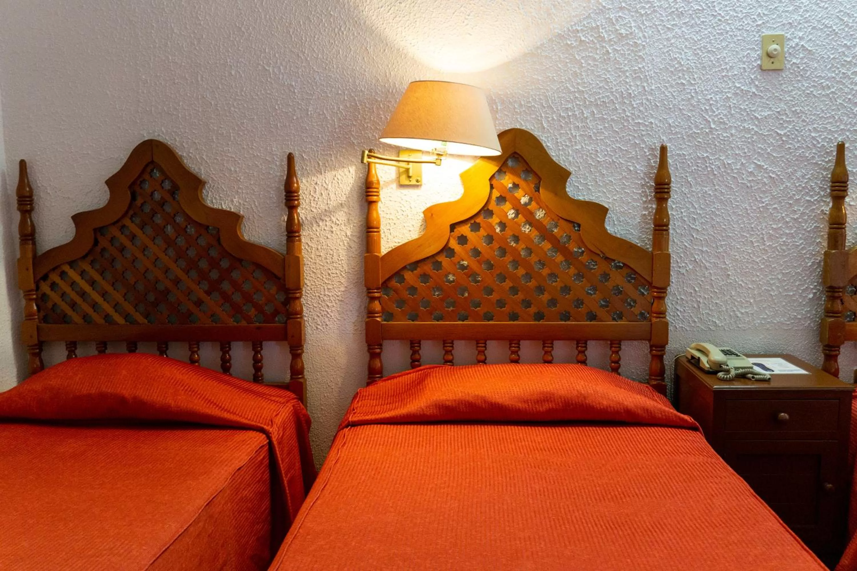 Bed in Hotel Colonial