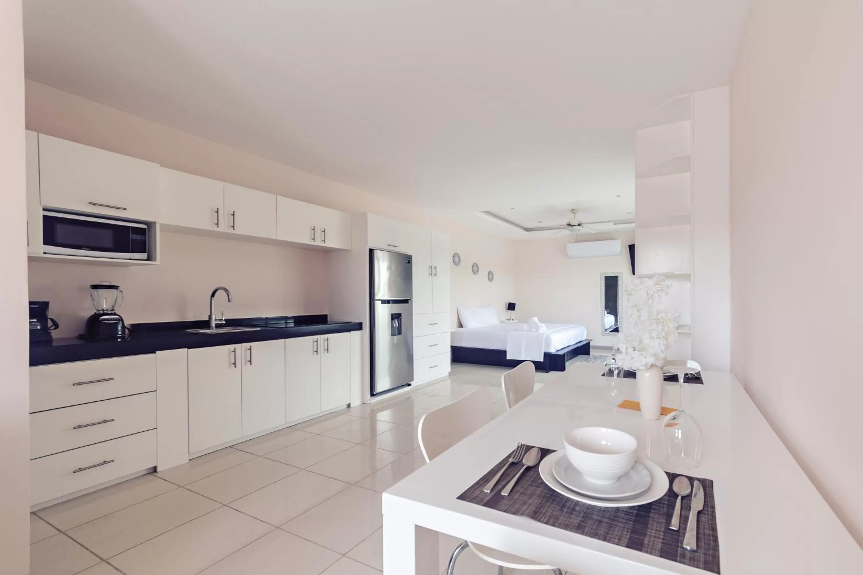 Kitchen or kitchenette in Hotel CARPE DIEM Tulum by Nah Hotels