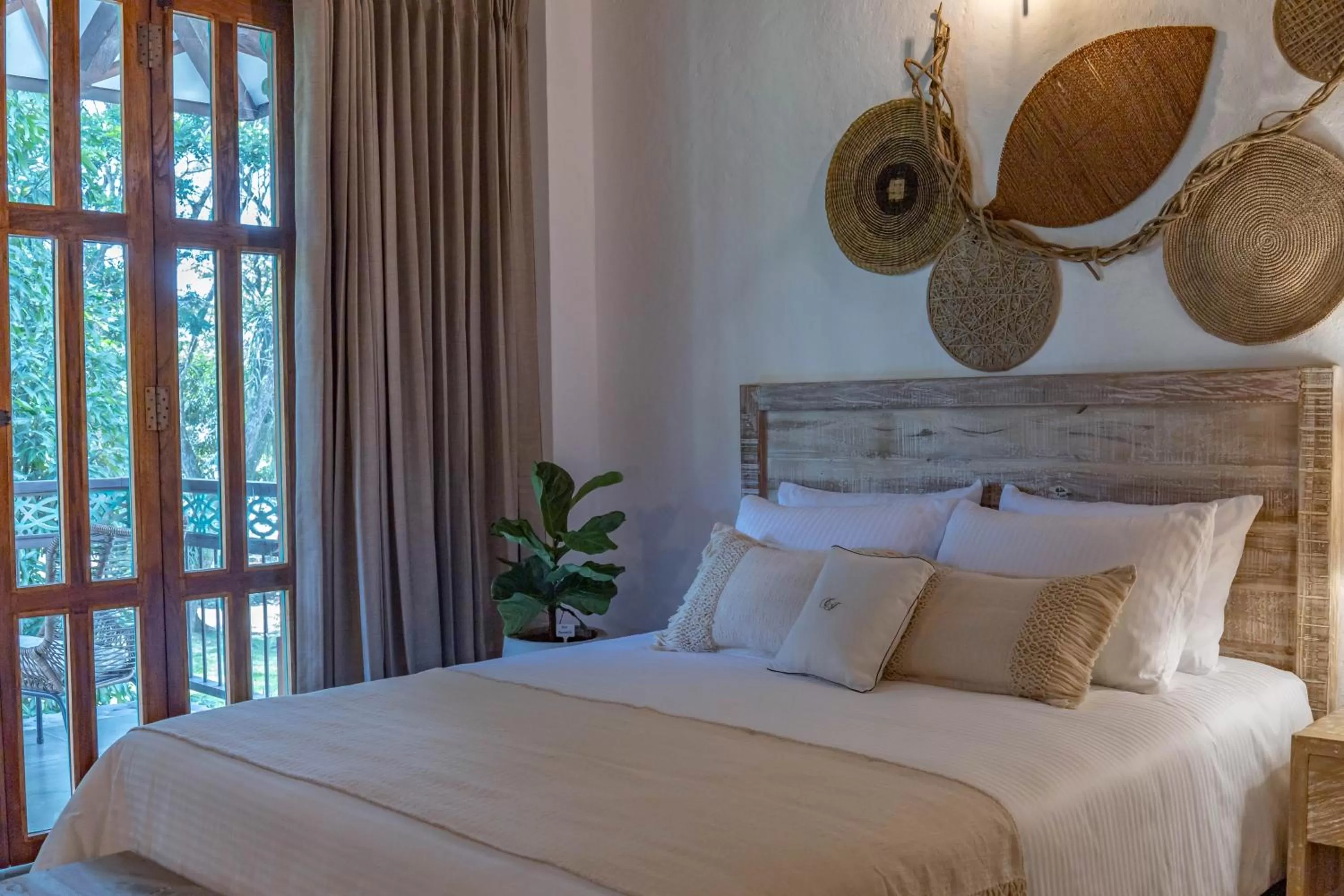 Bed in Casa Jacaranda Hotel Boutique