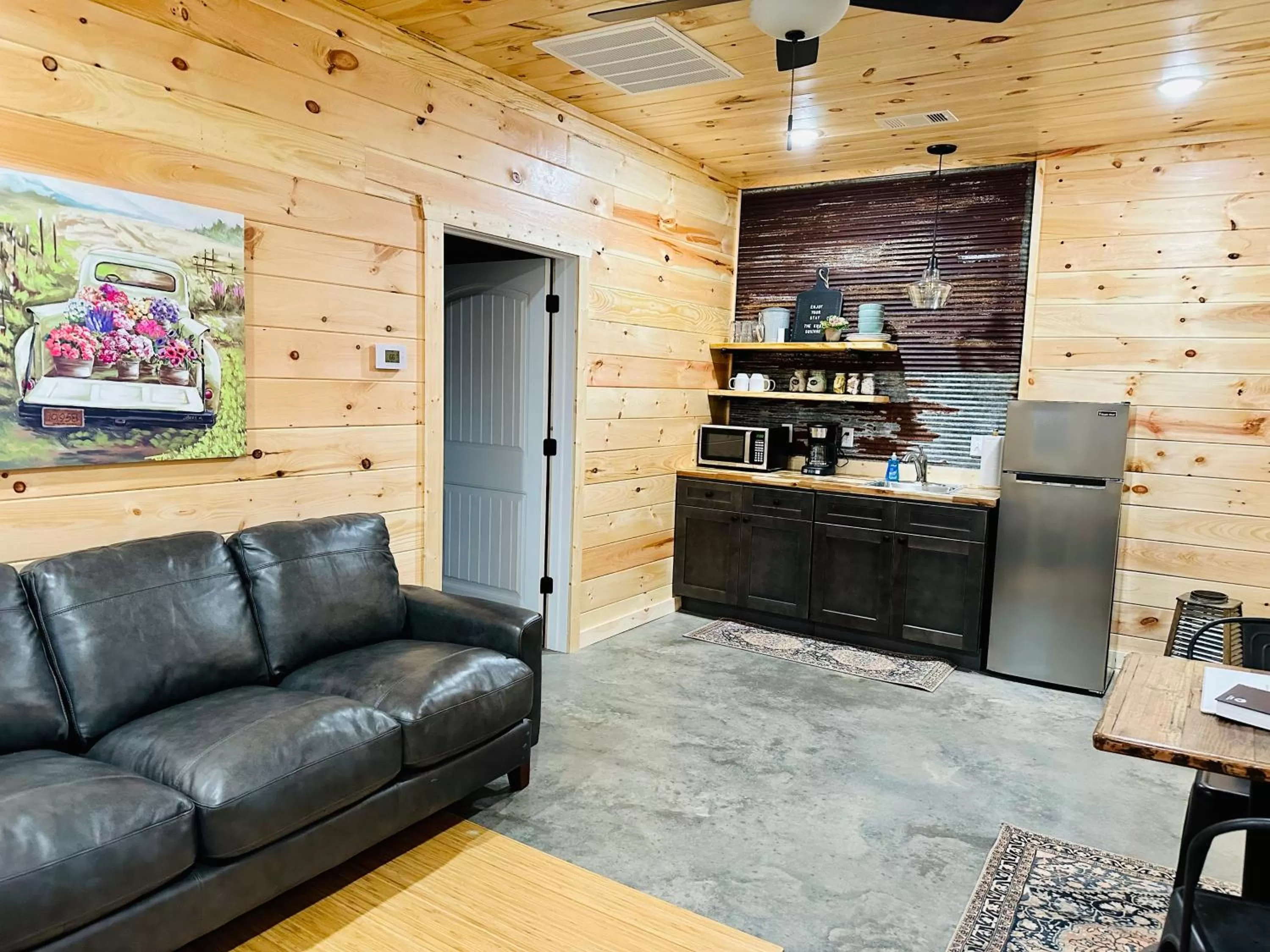 Kitchen or kitchenette in Knotty Squirrel Cabins