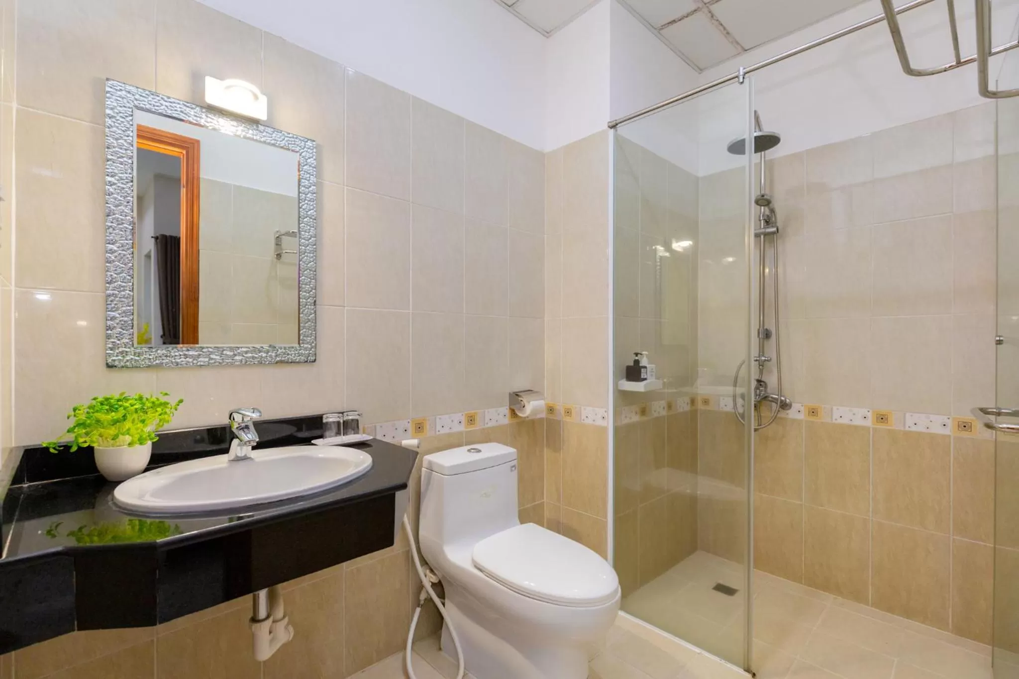 Shower in Queen Garden Hotel & Apartment