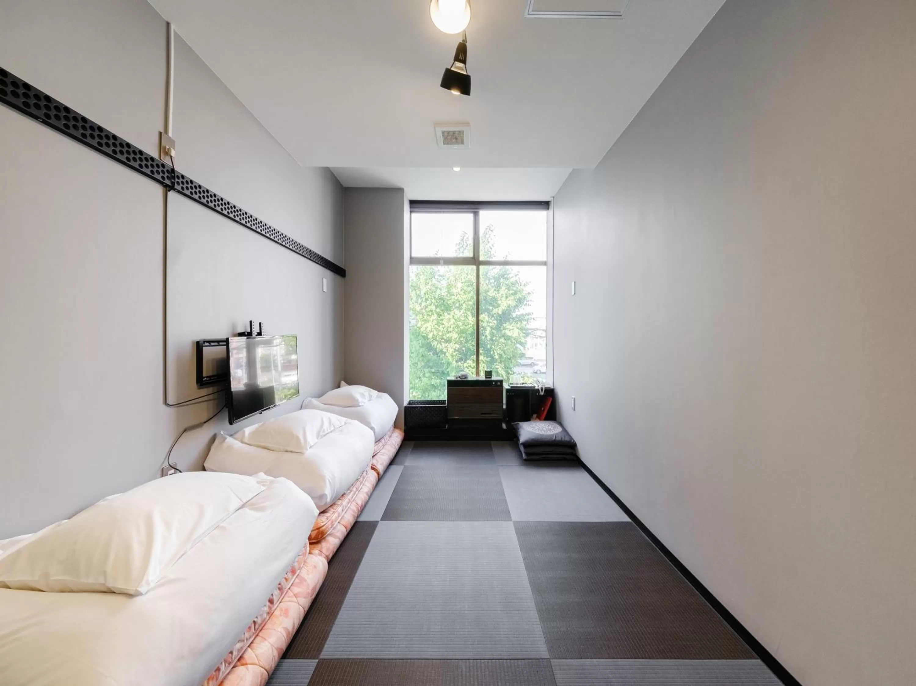 Bed in Tabist THE GREEN ASAHIKAWA