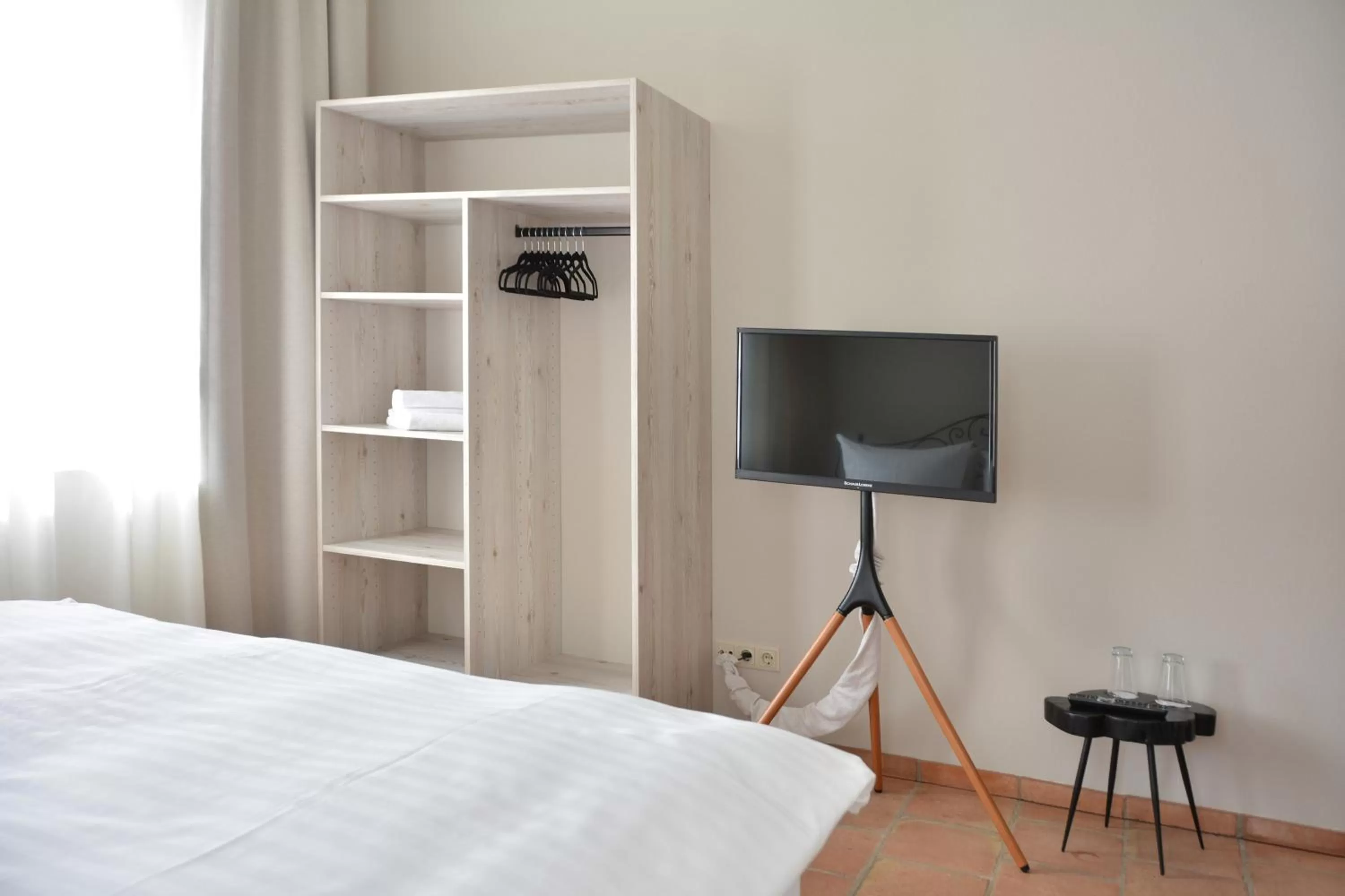 Bed, TV/Entertainment Center in Albergo-Toscana