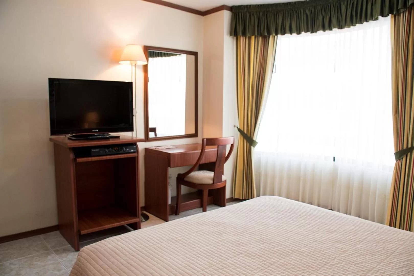 TV/Entertainment Center in REGAL HOTEL