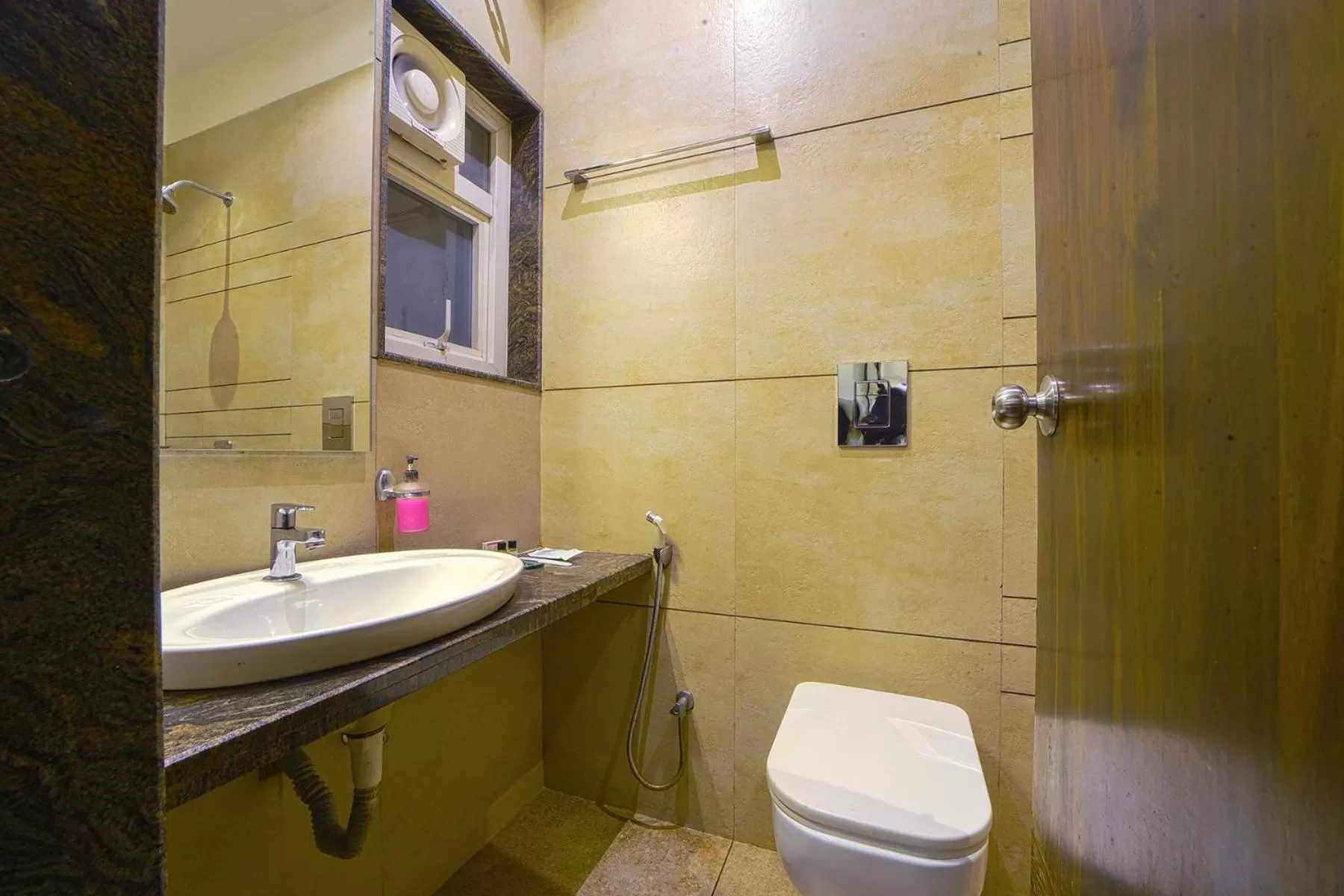 Bathroom in Hotel SRI SRI EXECUTIVE KOLHAPUR NEAR MAHALAXMI TEMPLE