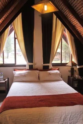 Garden view, Bed in Hacienda Hostería Dos Chorreras