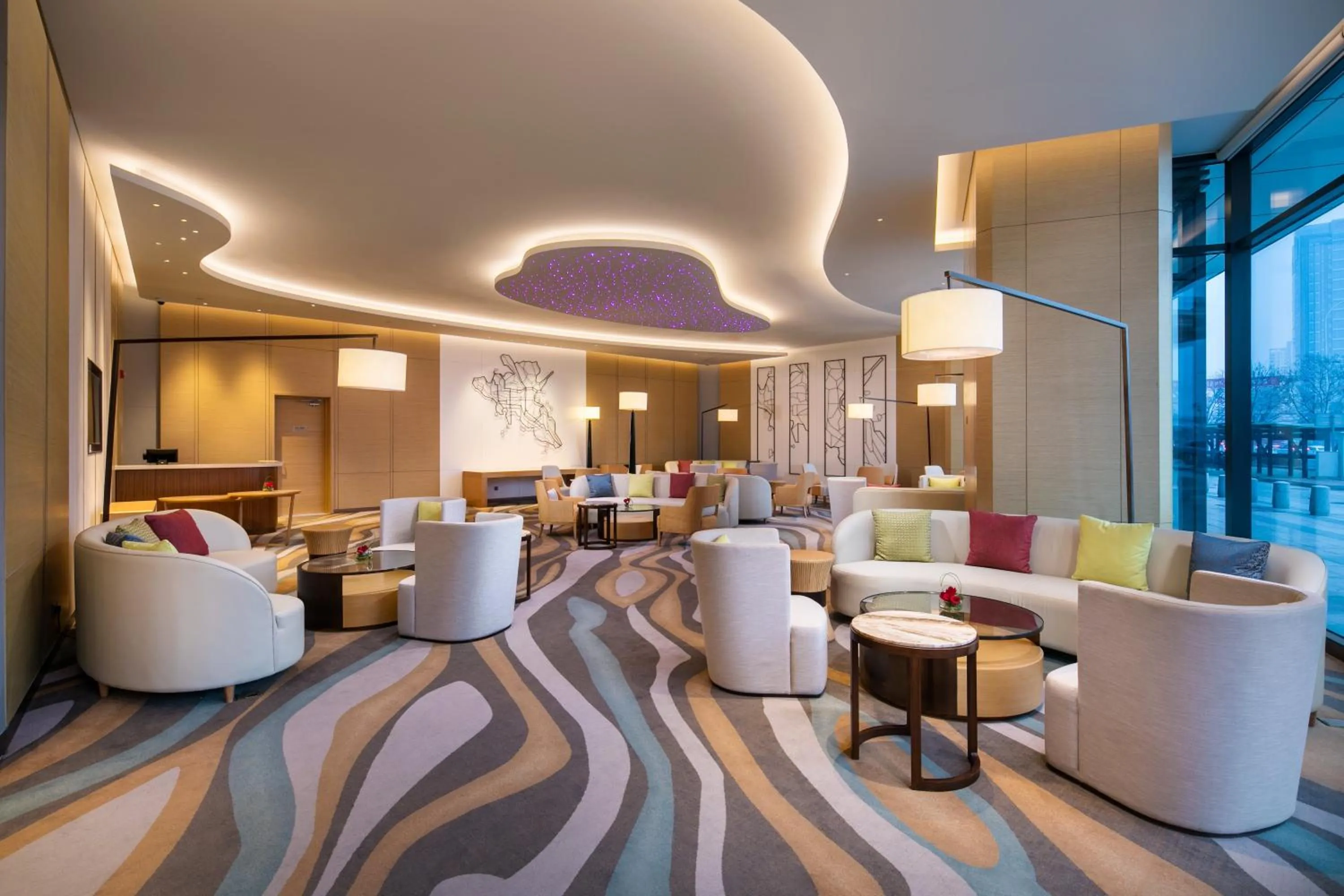 Lounge or bar in Holiday Inn Tianjin Xiqing by IHG