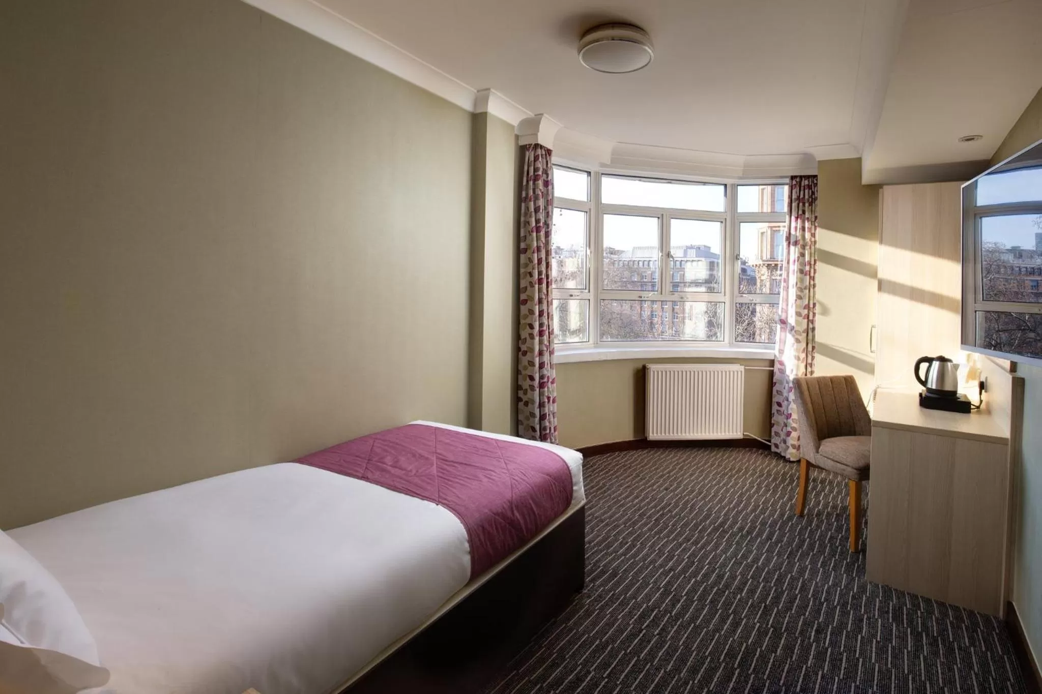 Photo of the whole room, Bed in President Hotel