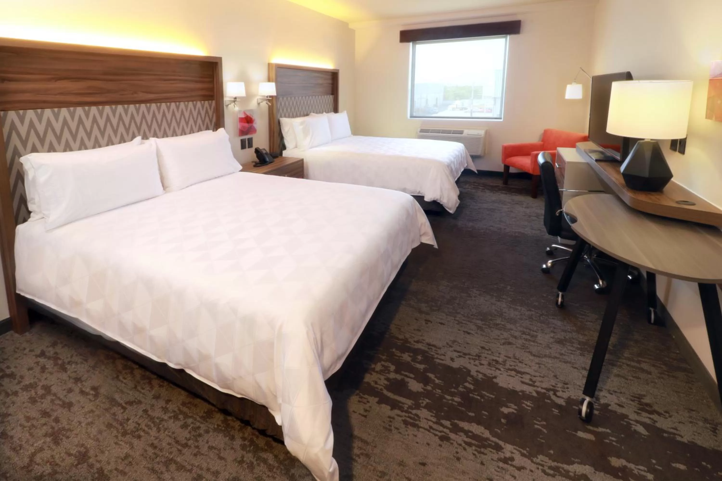 Photo of the whole room, Bed in Holiday Inn & Suites Monterrey Apodaca Zona Airport, an IHG hotel