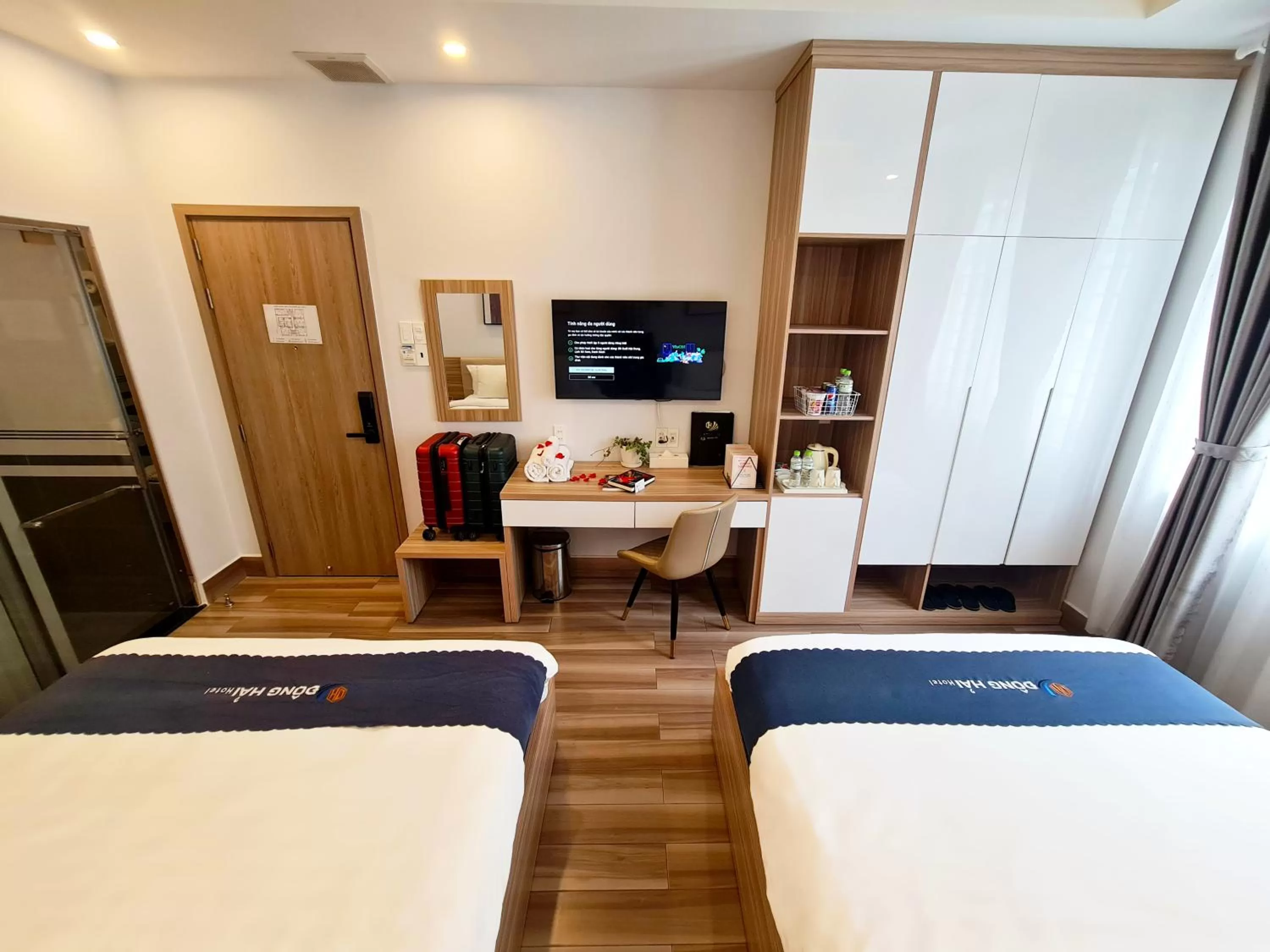 TV and multimedia, Bed in Dong Hai Hotel _ Rach Gia