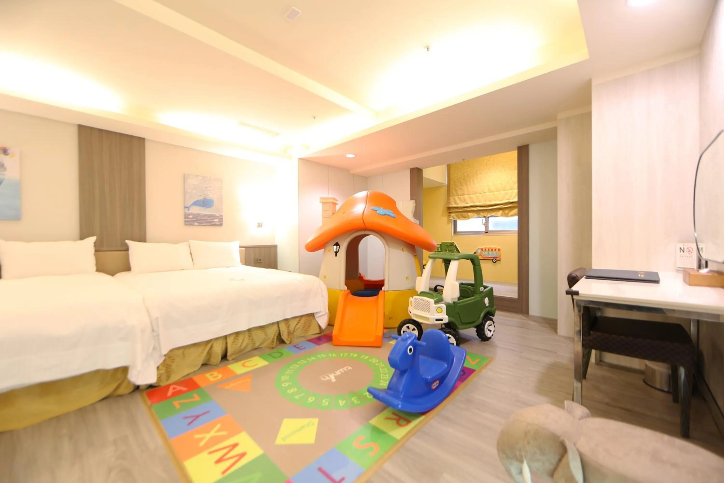 Bed in Grand Earl Hotel